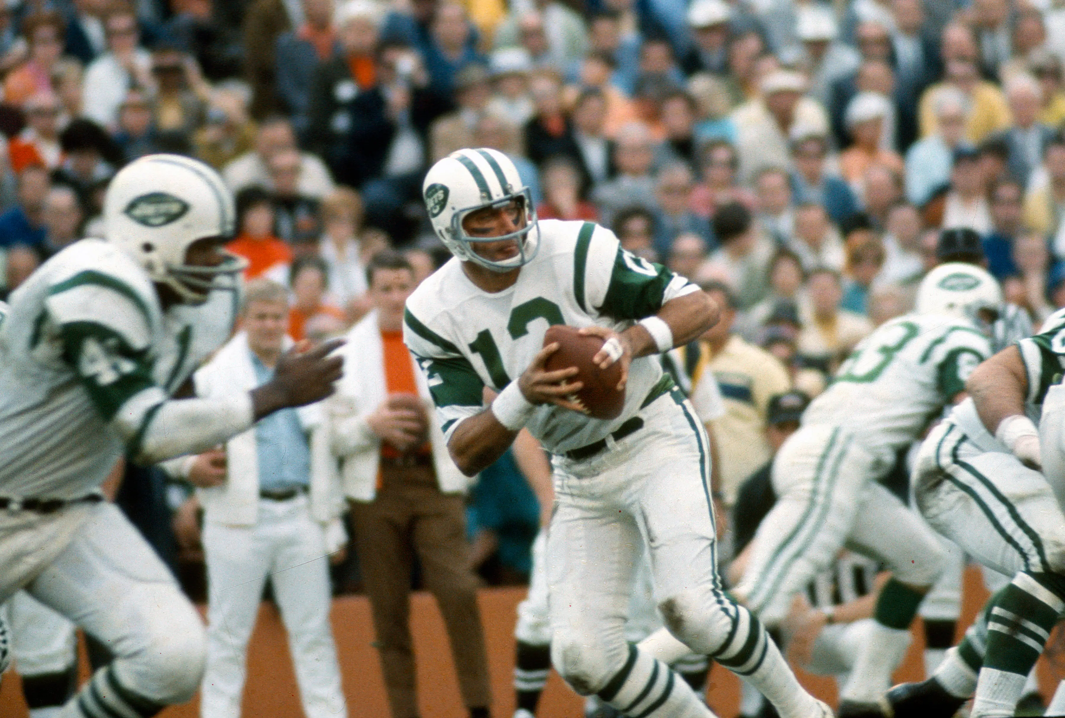 Joe Namath dropped back to throw the football during Super Bowl III.