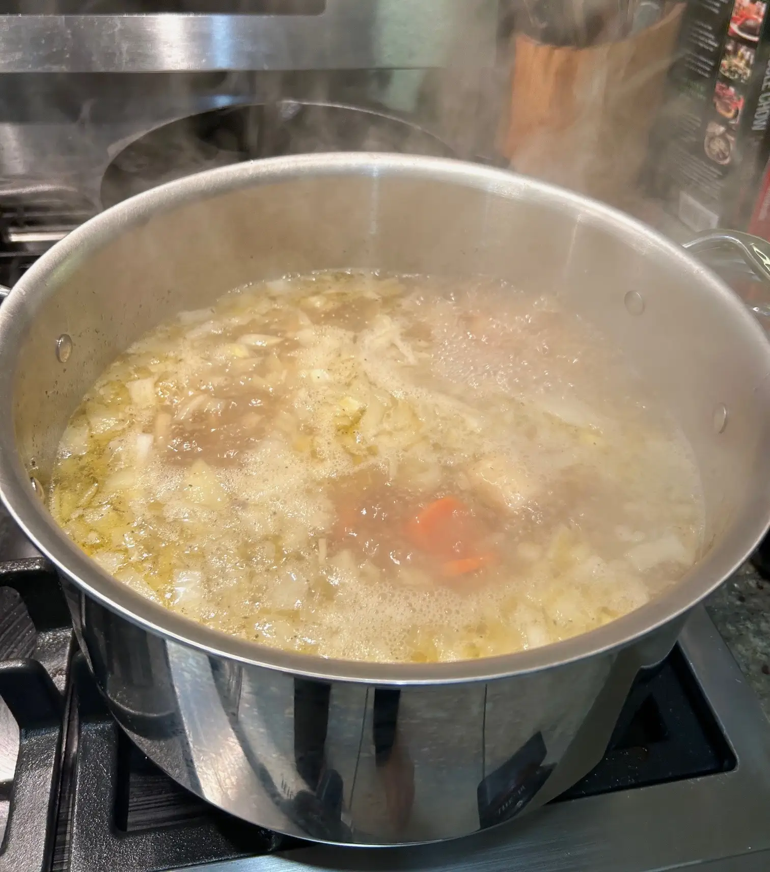 Simmering Ina Garten's ravioli en brodo
