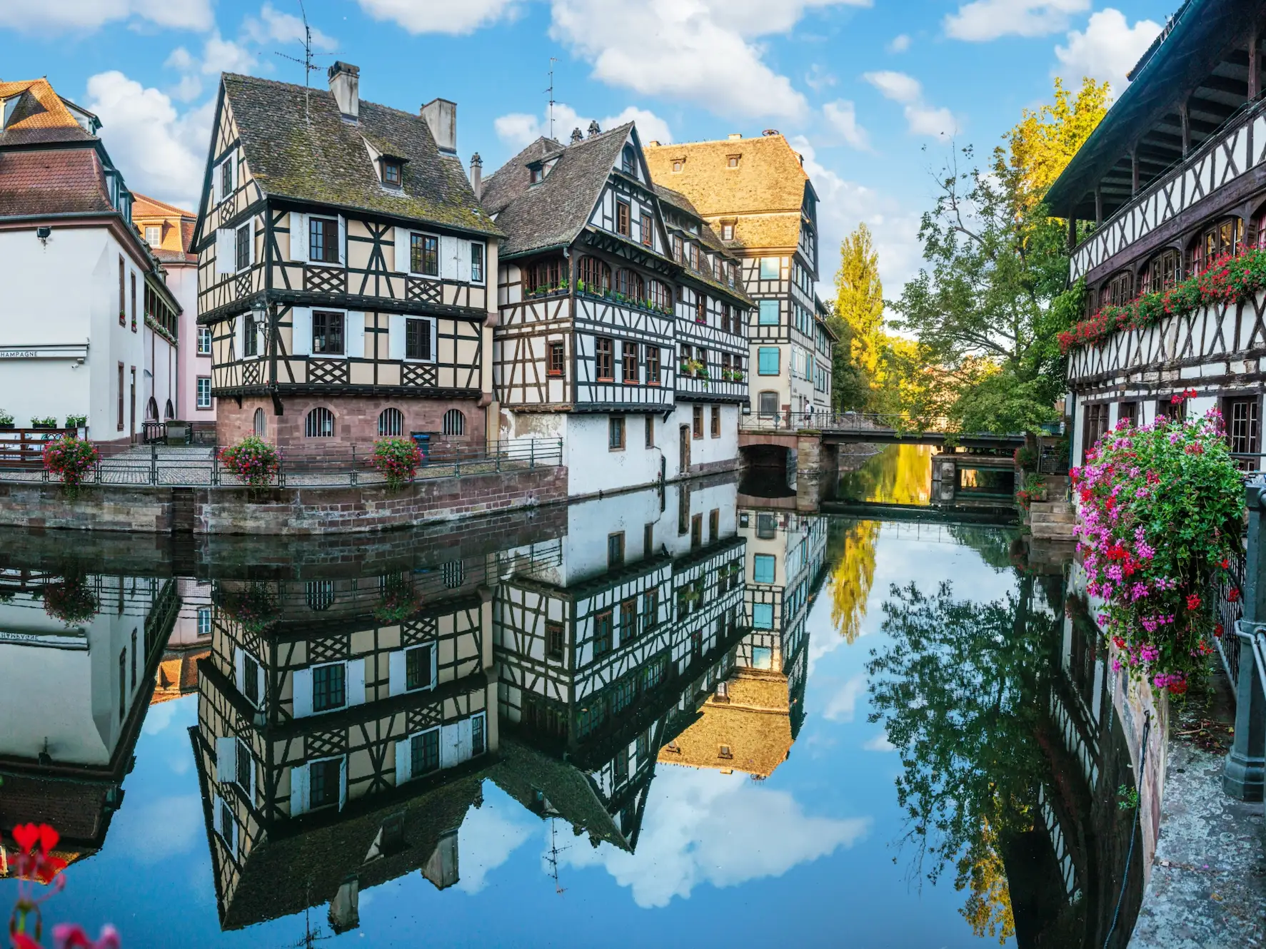 Old German-style houses along a river.