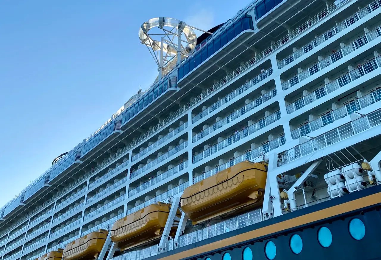 View of balconies and life boats on side of Disney Dream