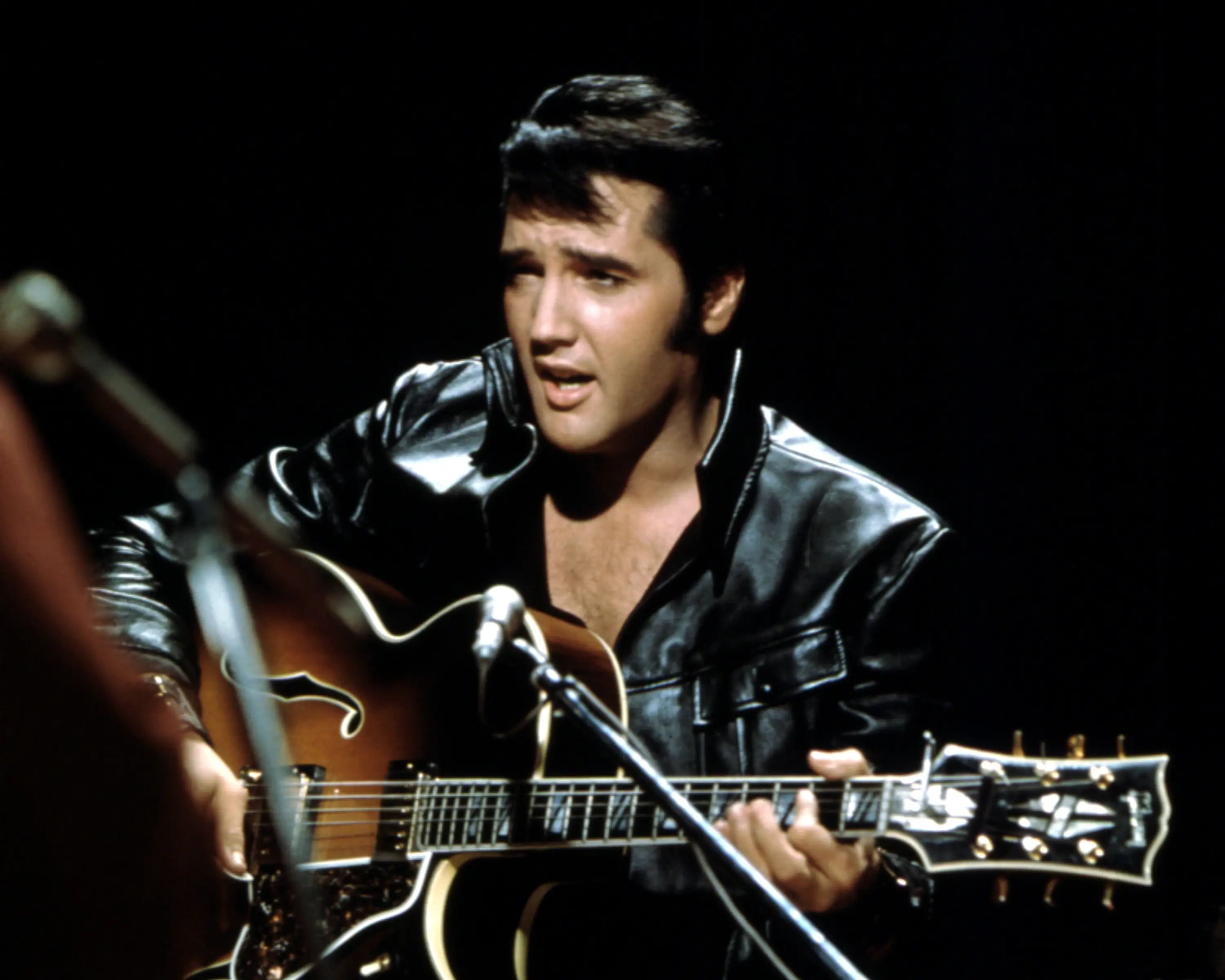 Rock and roll musician Elvis Presley performing on the Elvis comeback TV special on June 27, 1968.