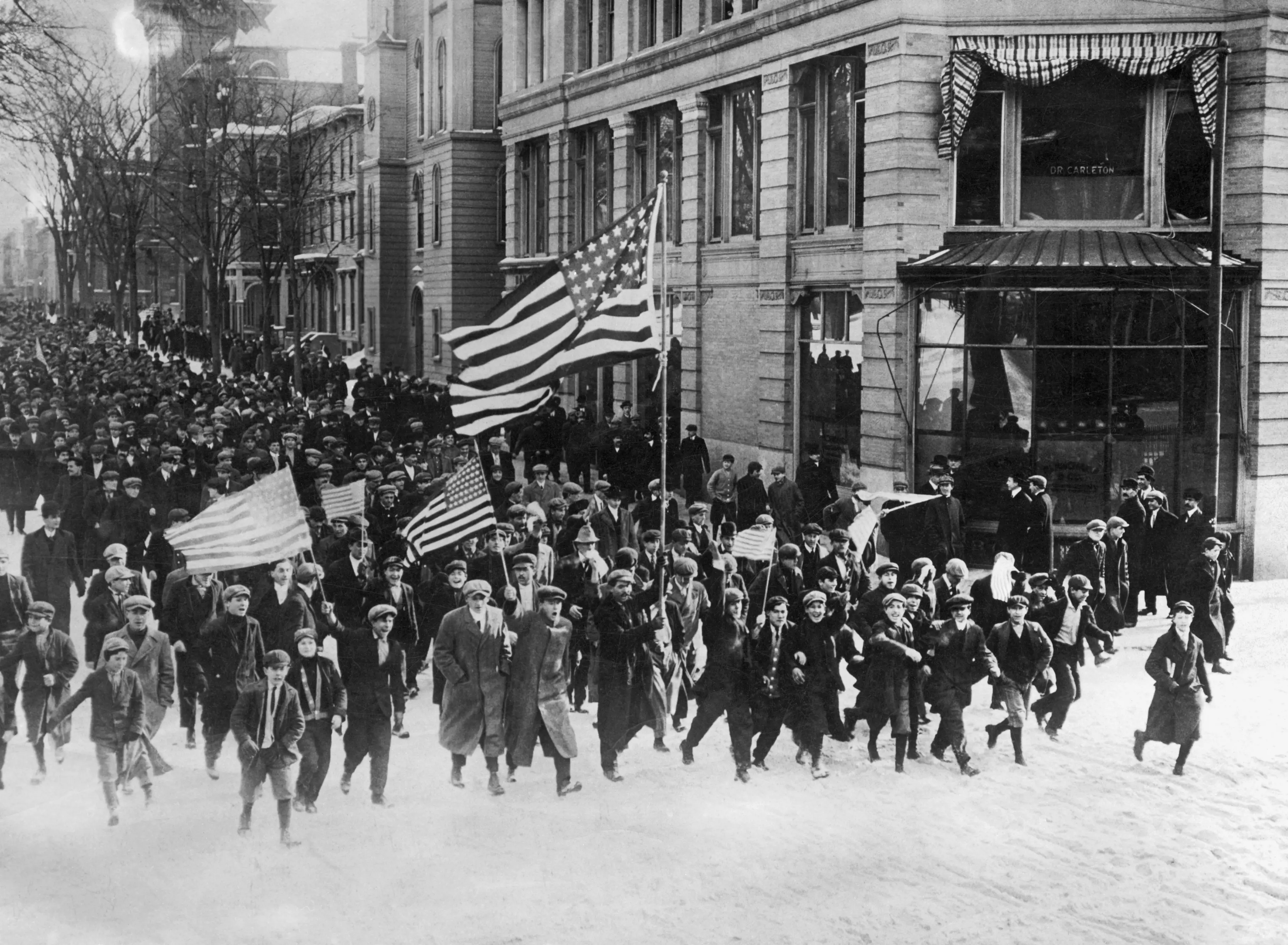 Lawrence, MA- Picture shows Striking workers walking to attack the mill.