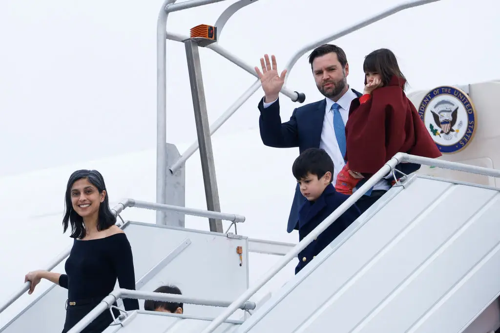JD Vance and Usha Vance disembark Air Force Two with their children.