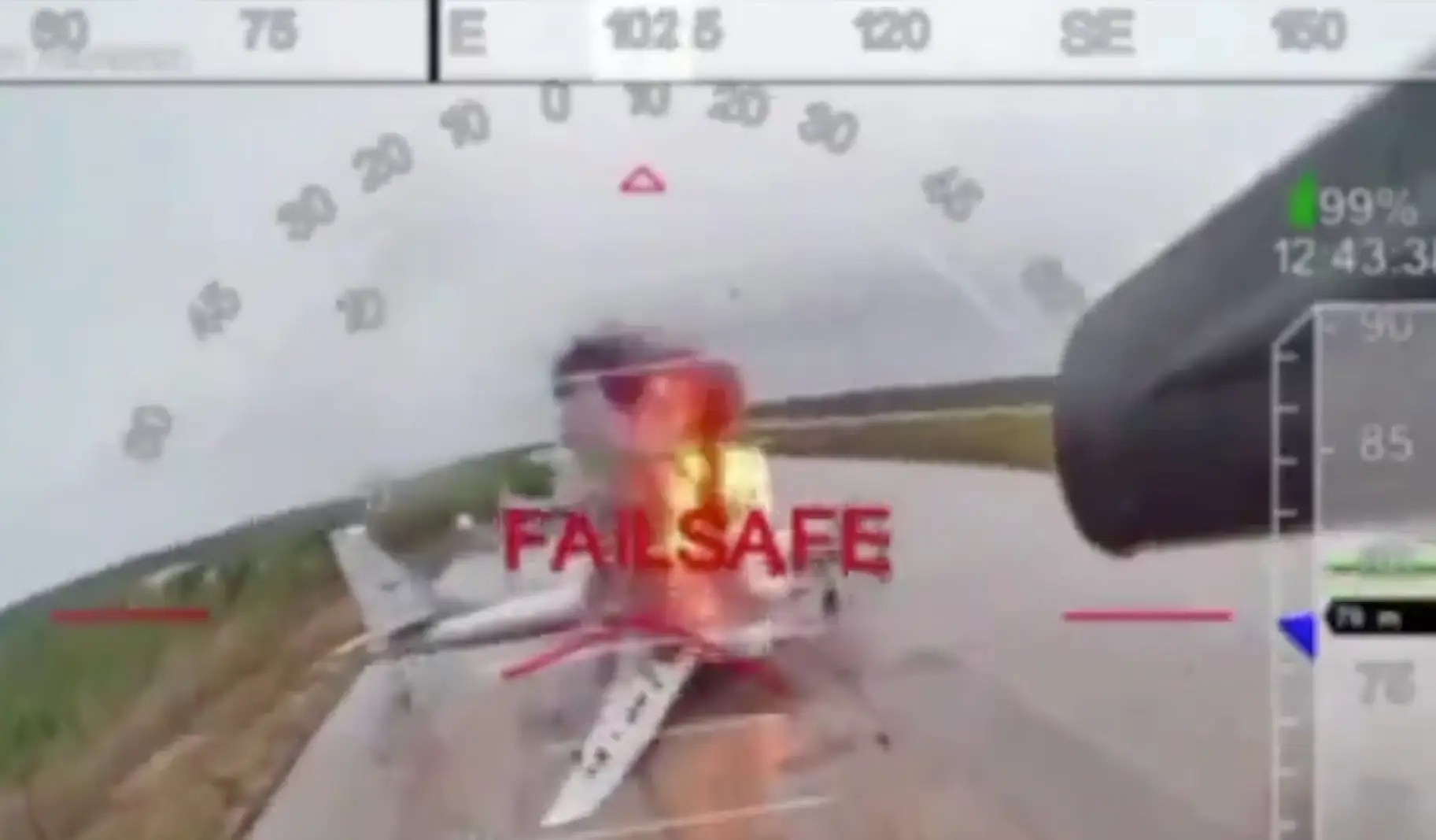 An image from the camera of a drone showing a plane exploding.