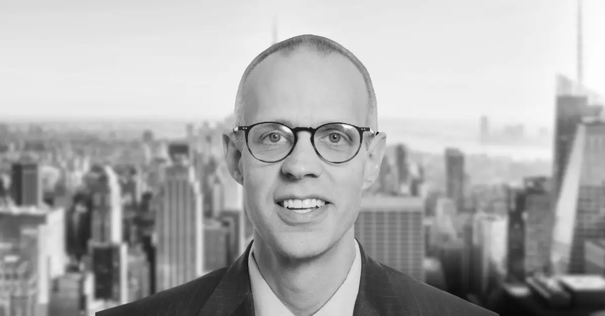 New Holland CEO Scott Radke stands against the New York skyline