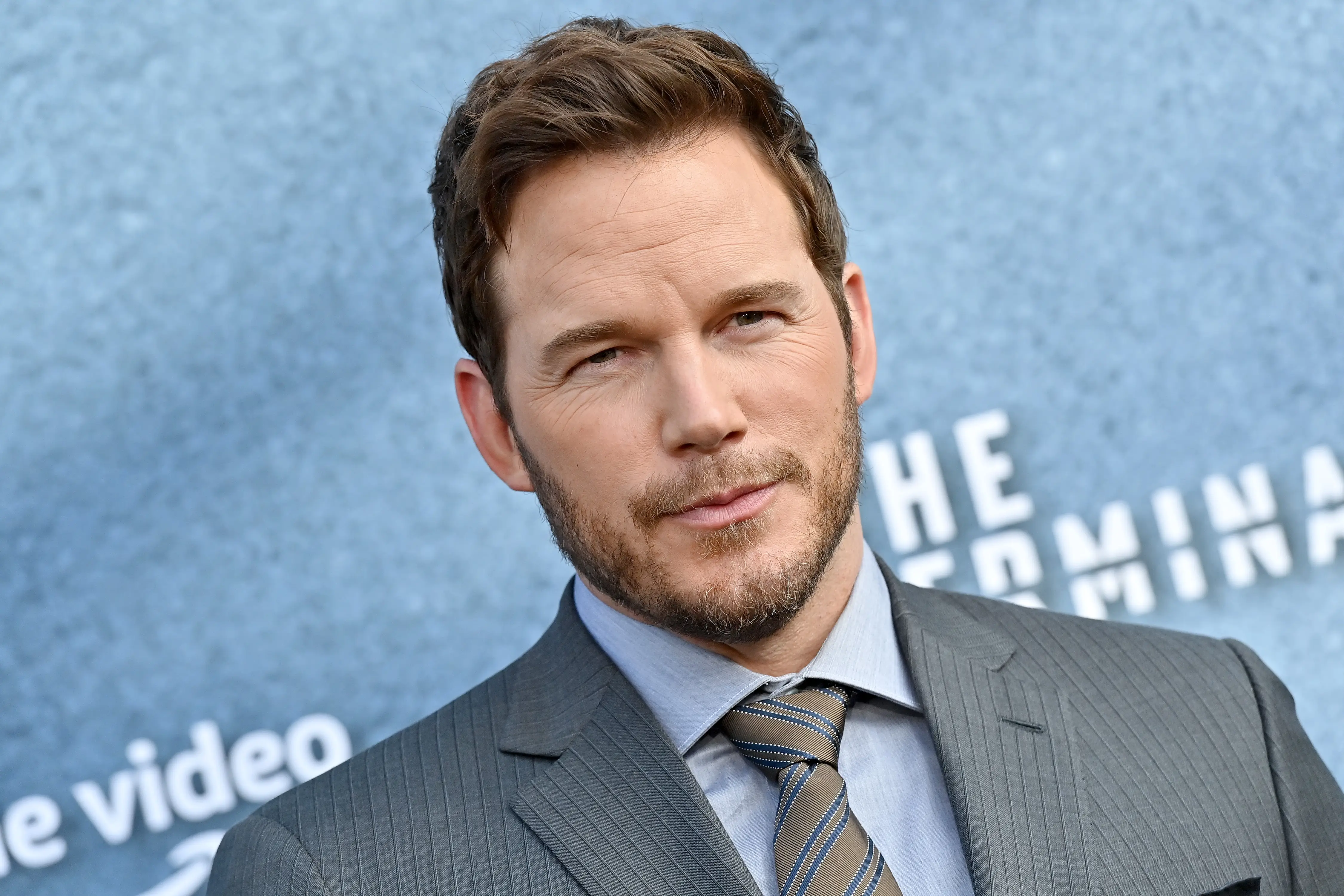 Chris Pratt in a grey suit