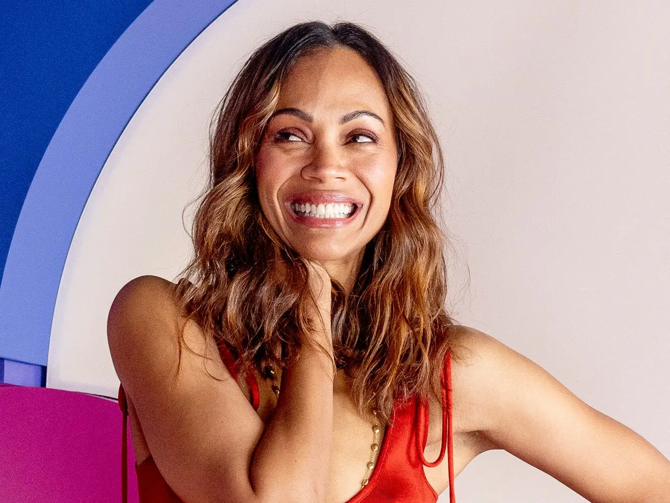 Zoe Saldana in a red dress