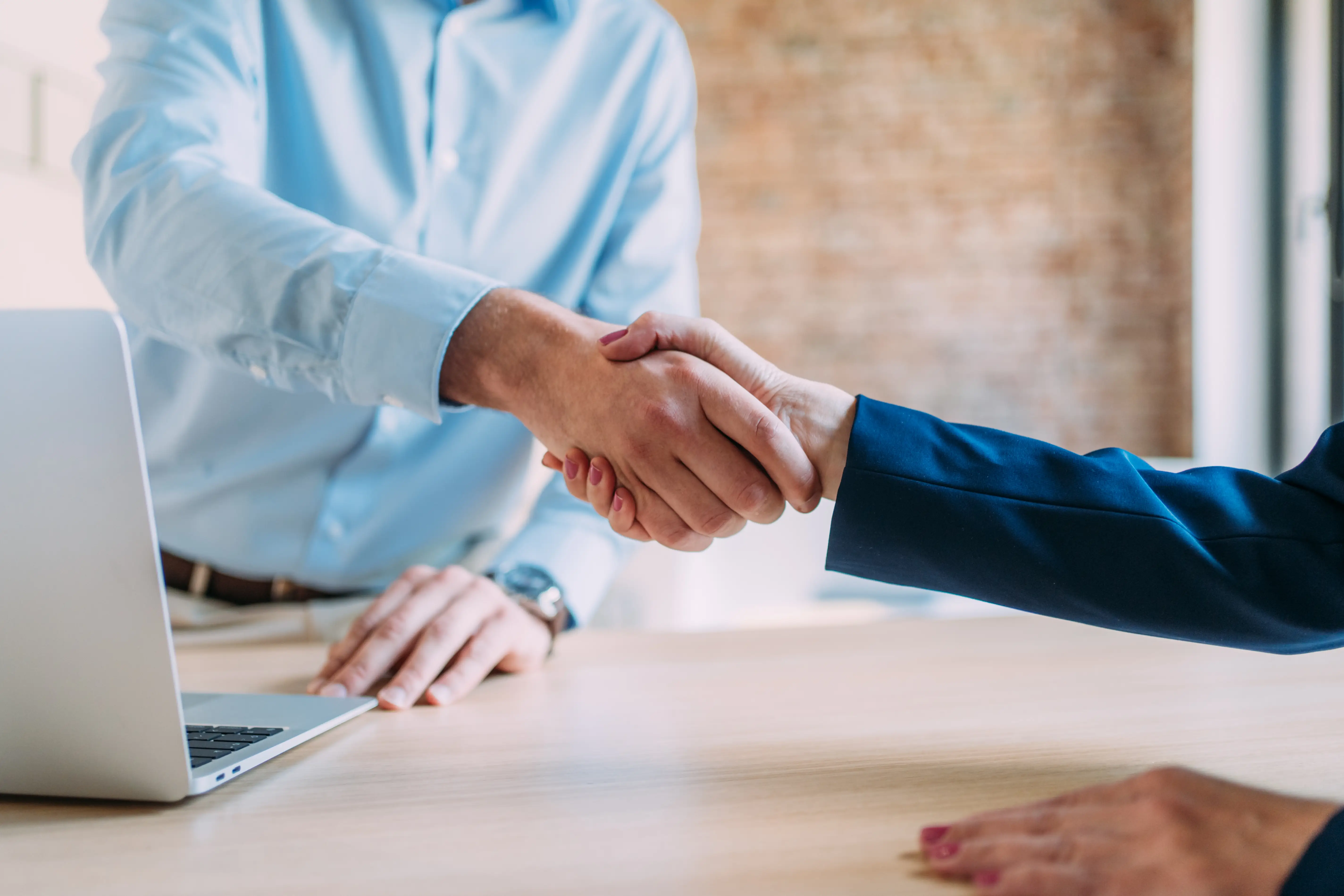 Coworkers shaking hands