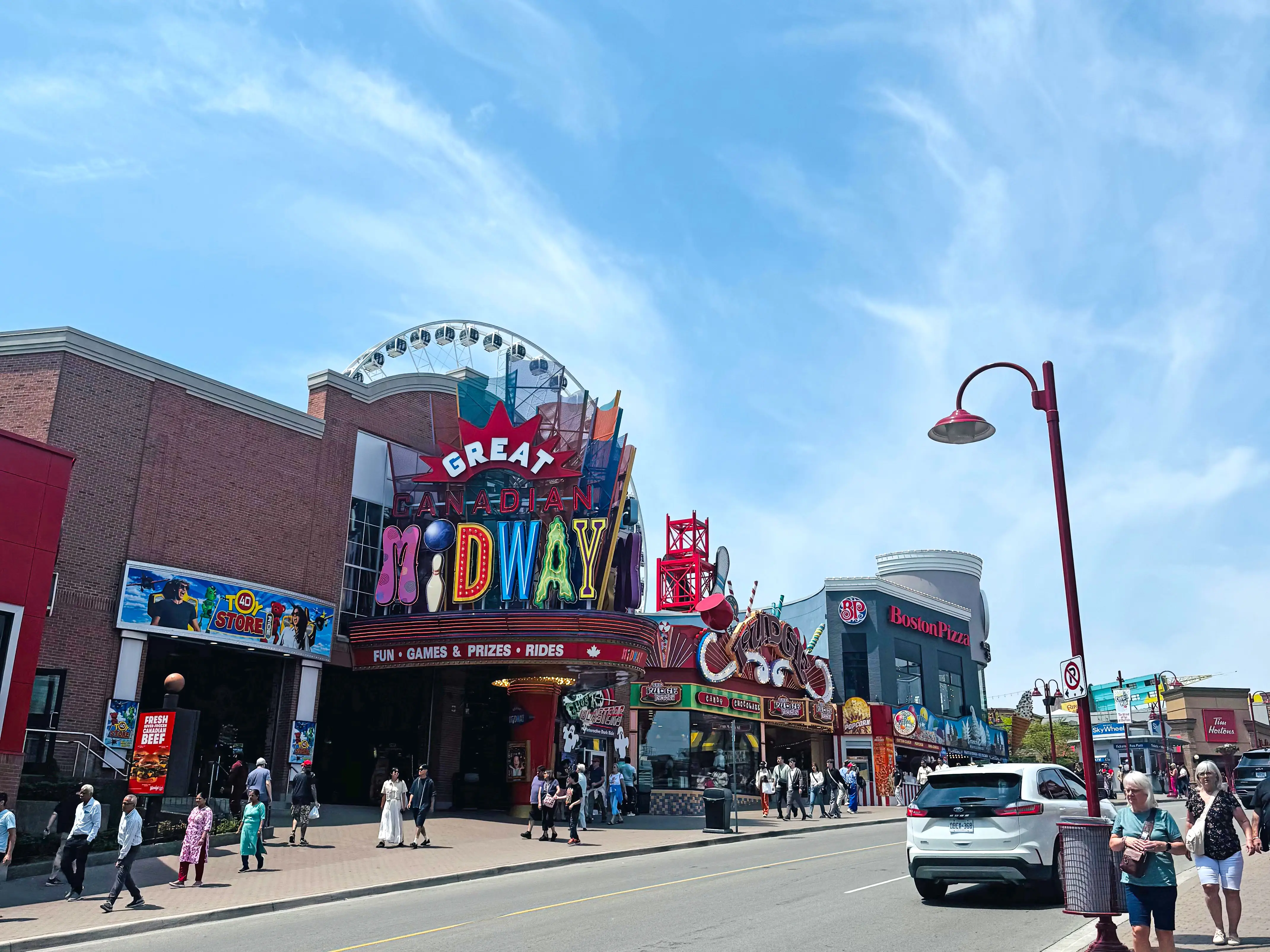 A stretch of tourist-centric shops, restaurants, and attractions in Canada.