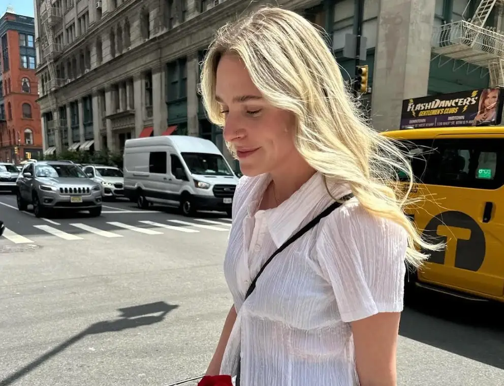 The writer walking down the street in New York City.