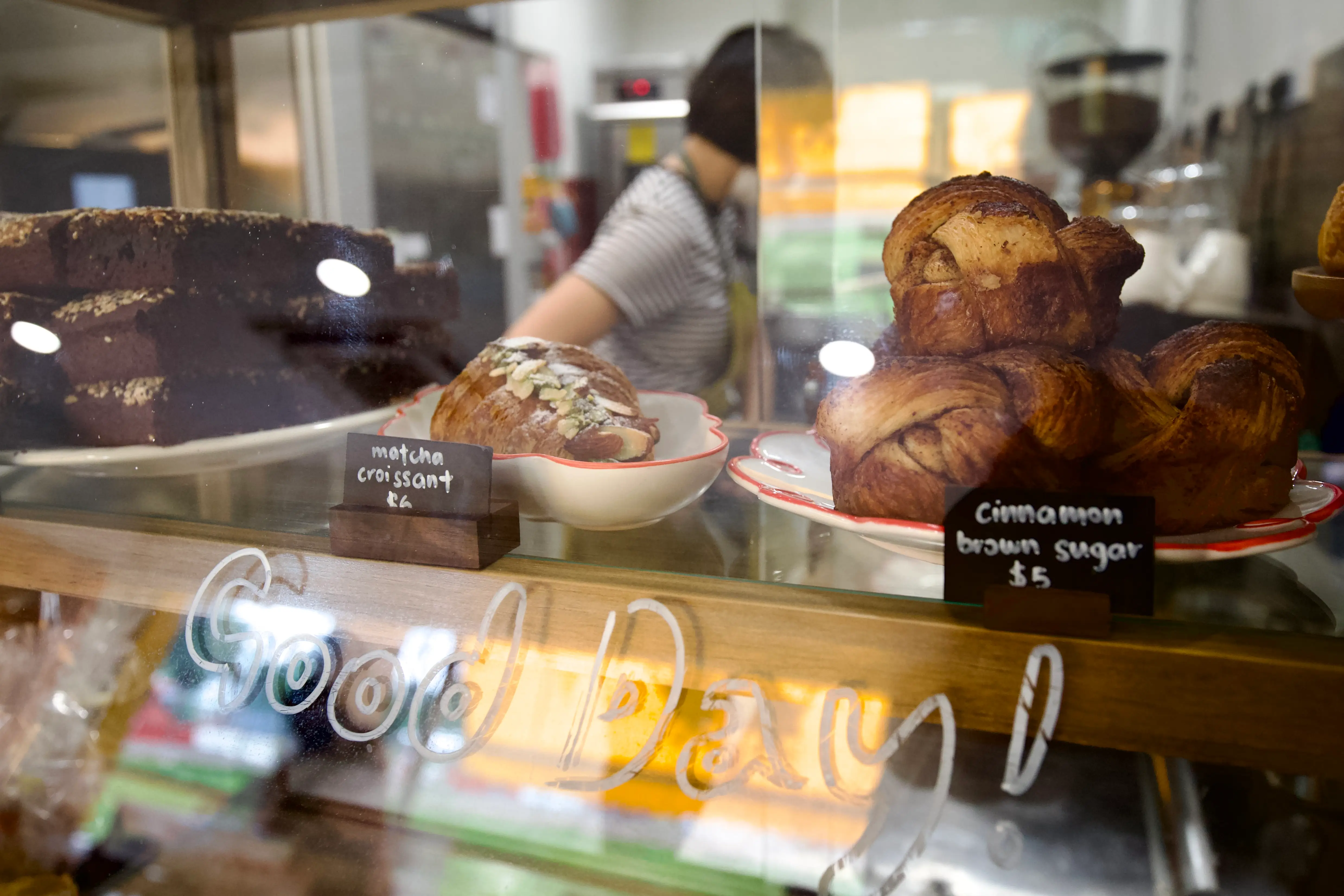 The Weirdoughs' baked goods selection, which includes matcha croissants and cinnamon brown sugar knots.