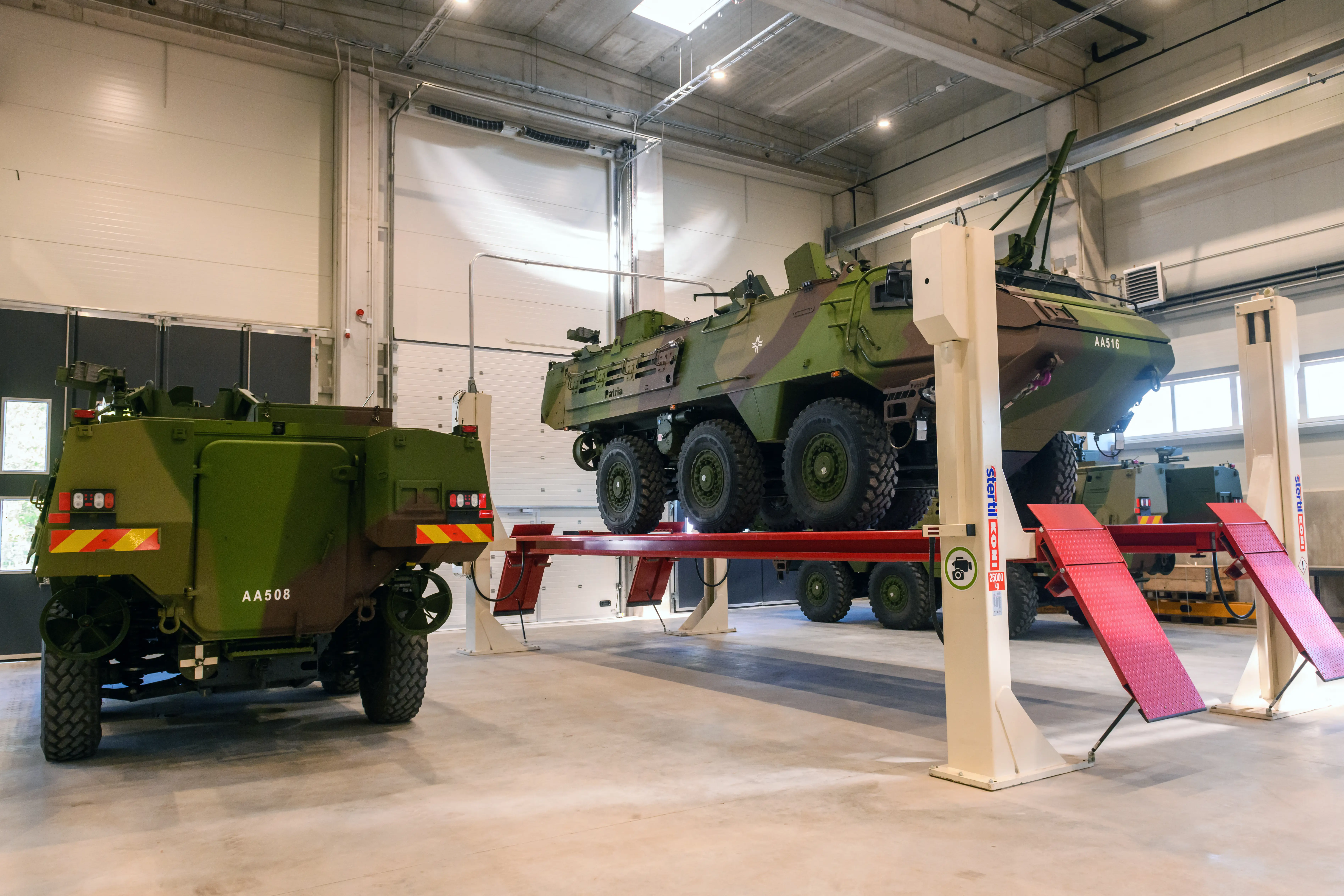 Patria armored vehicles are seen on the factory floor of a production facility in Latvia.