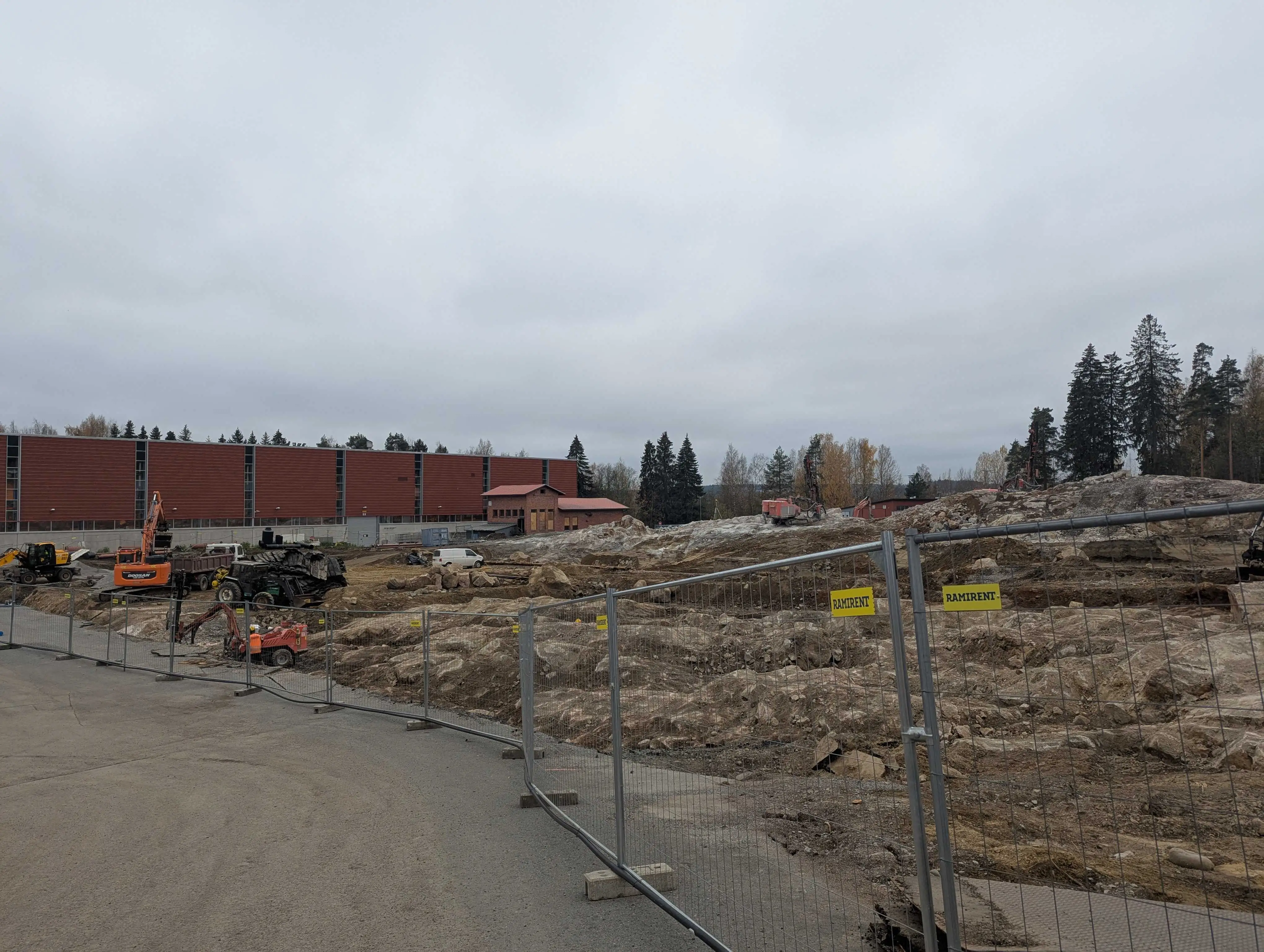 Construction crews clear rocks at Patria's factory campus.