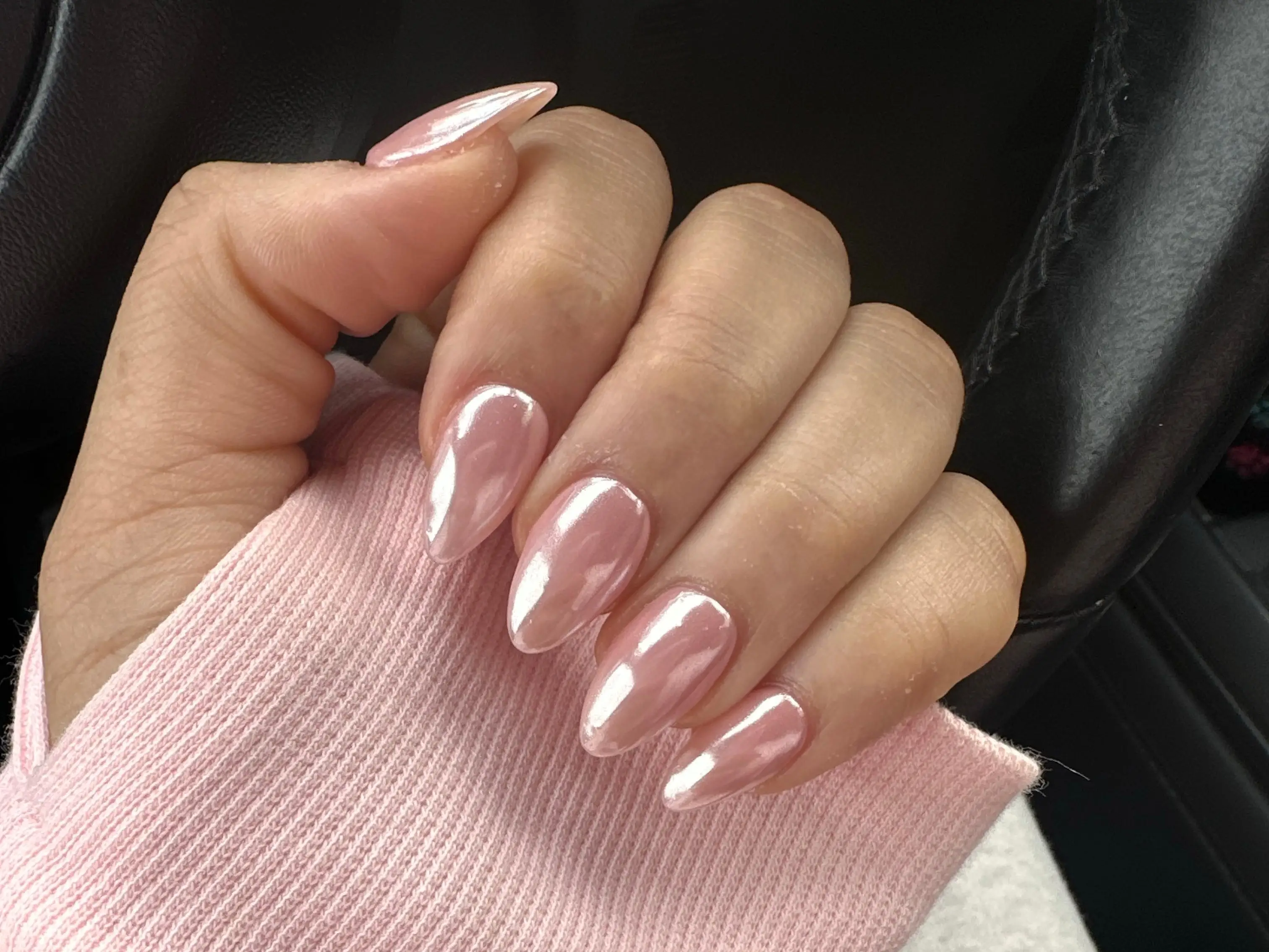 A light-pink chrome manicure.