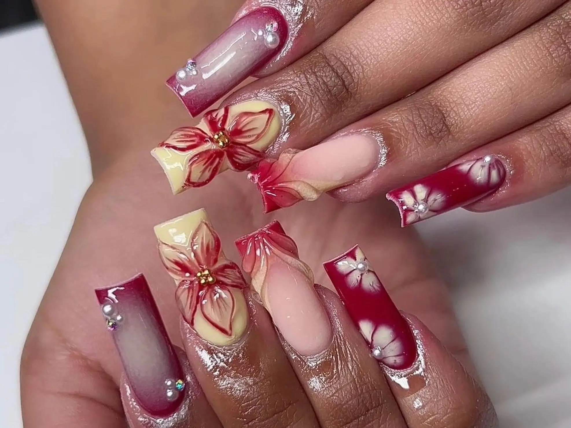 An intricately designed nail set, complete with 3D gel and gems.