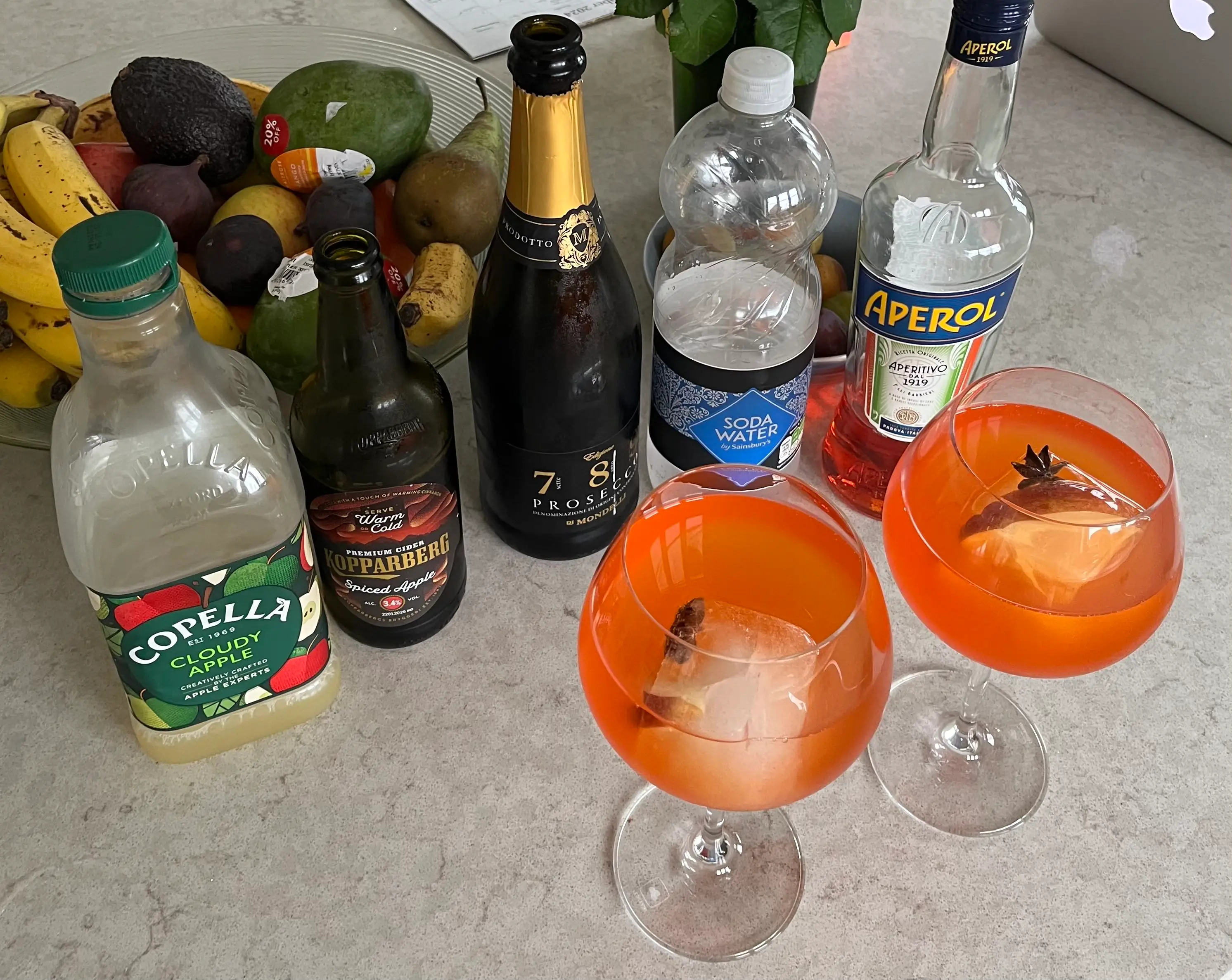 festive spritz ingredients on table