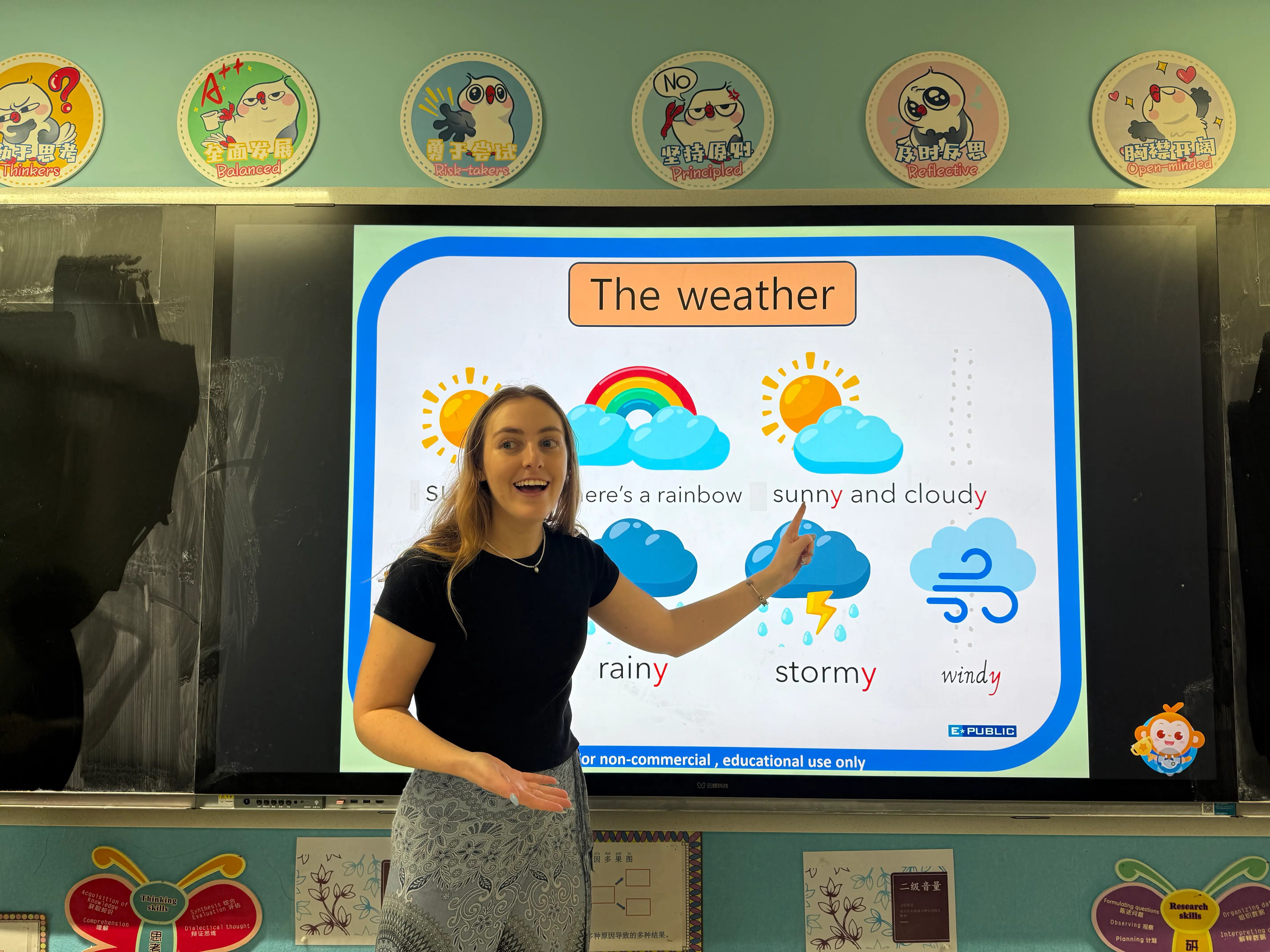 A girl teaching English in a Chinese school.