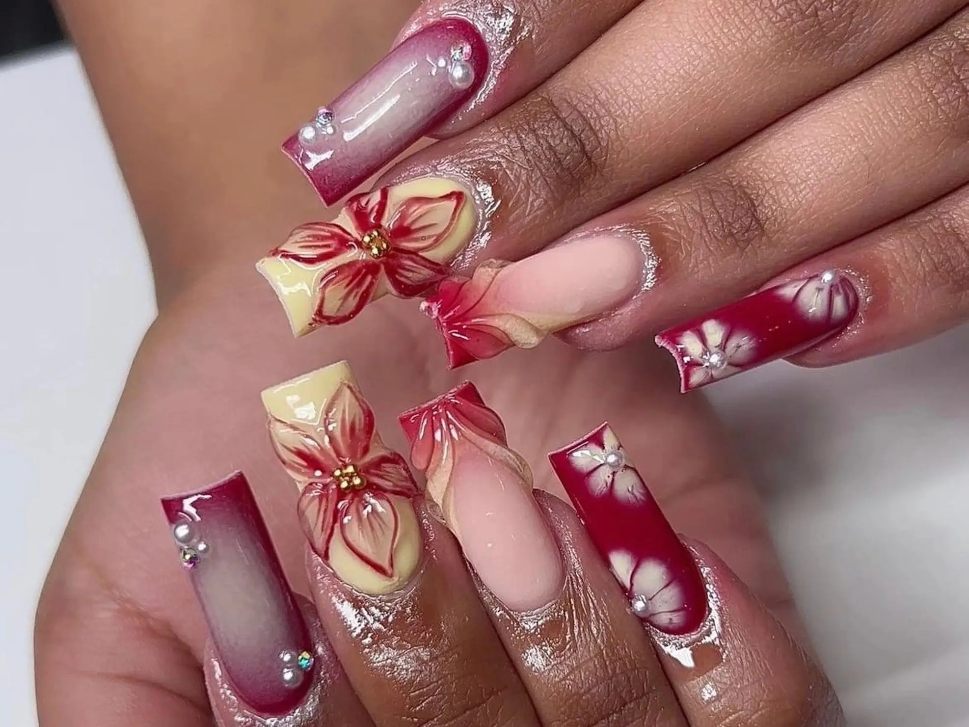 An intricately designed nail set, complete with 3D gel and gems.