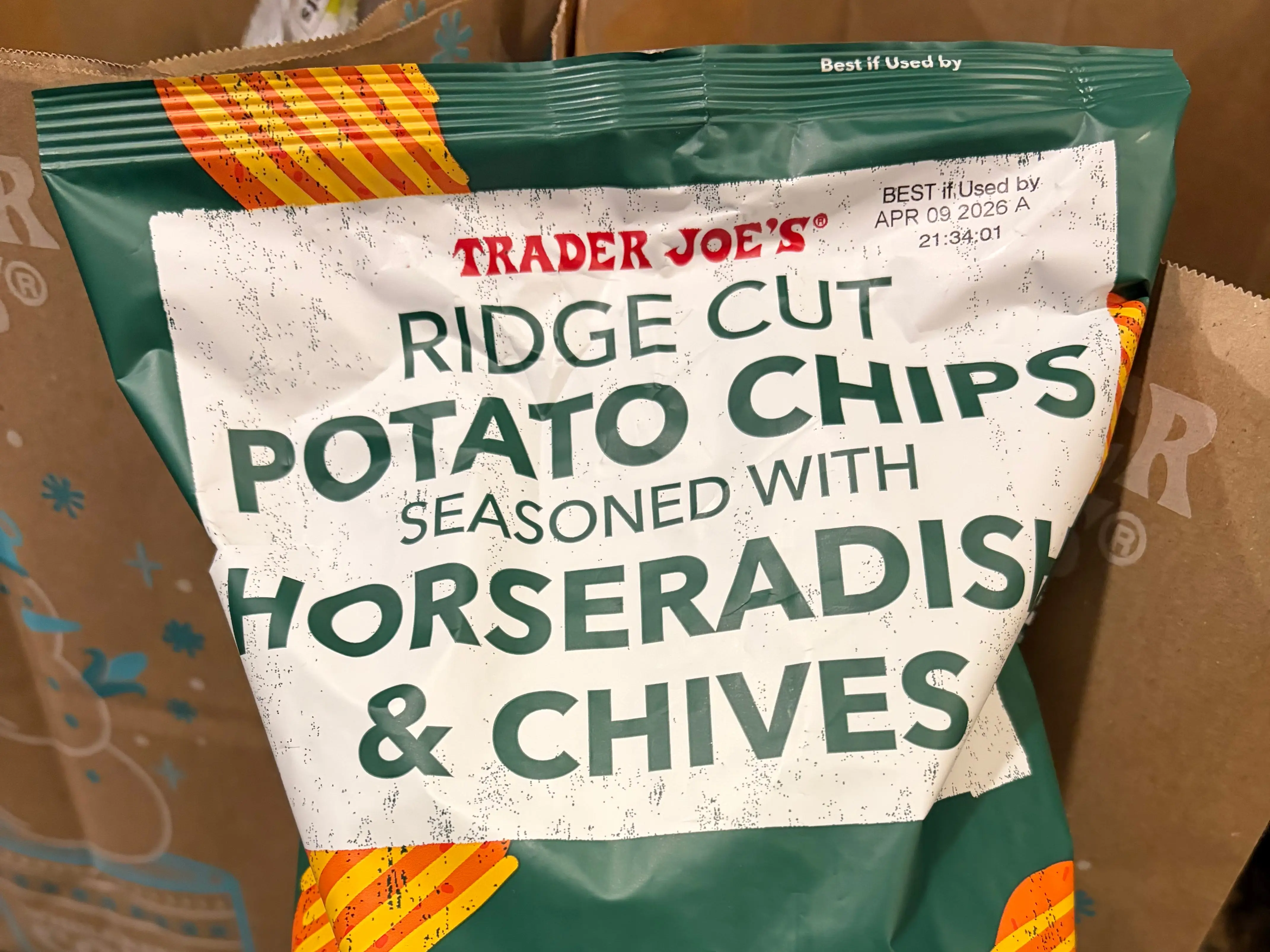 Trader Joe's ridge cut potato chips seasoned with horseradish and chives.