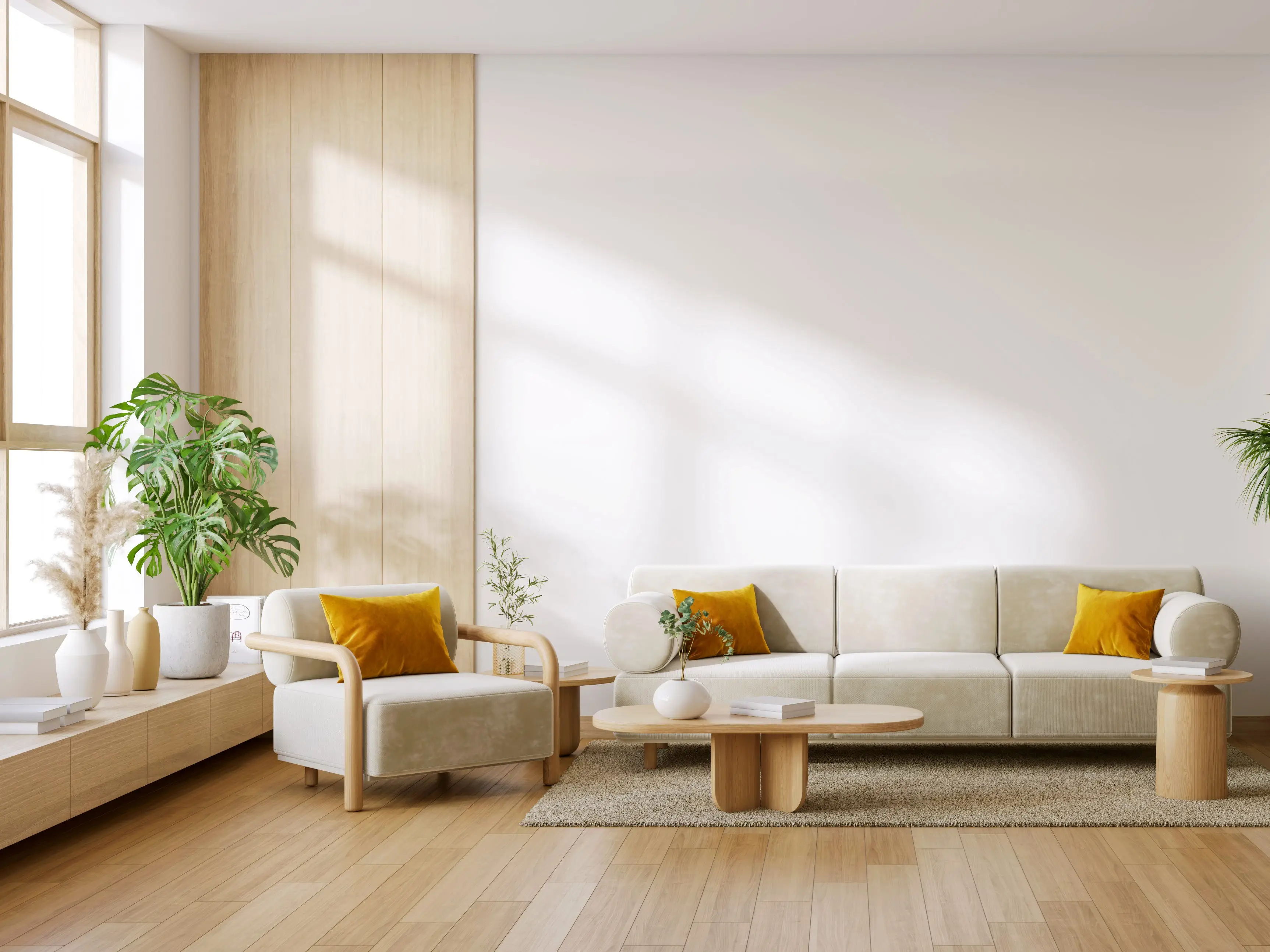 A beige living room with matching white chairs and a sofa.