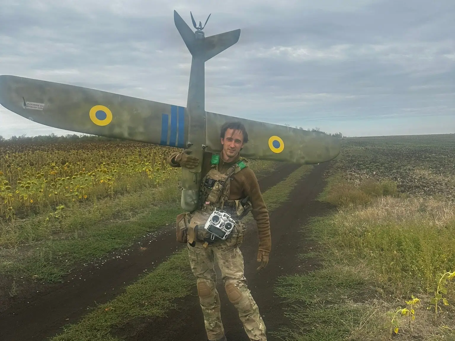 Zhluktenko carries a fixed-wing ISR drone.