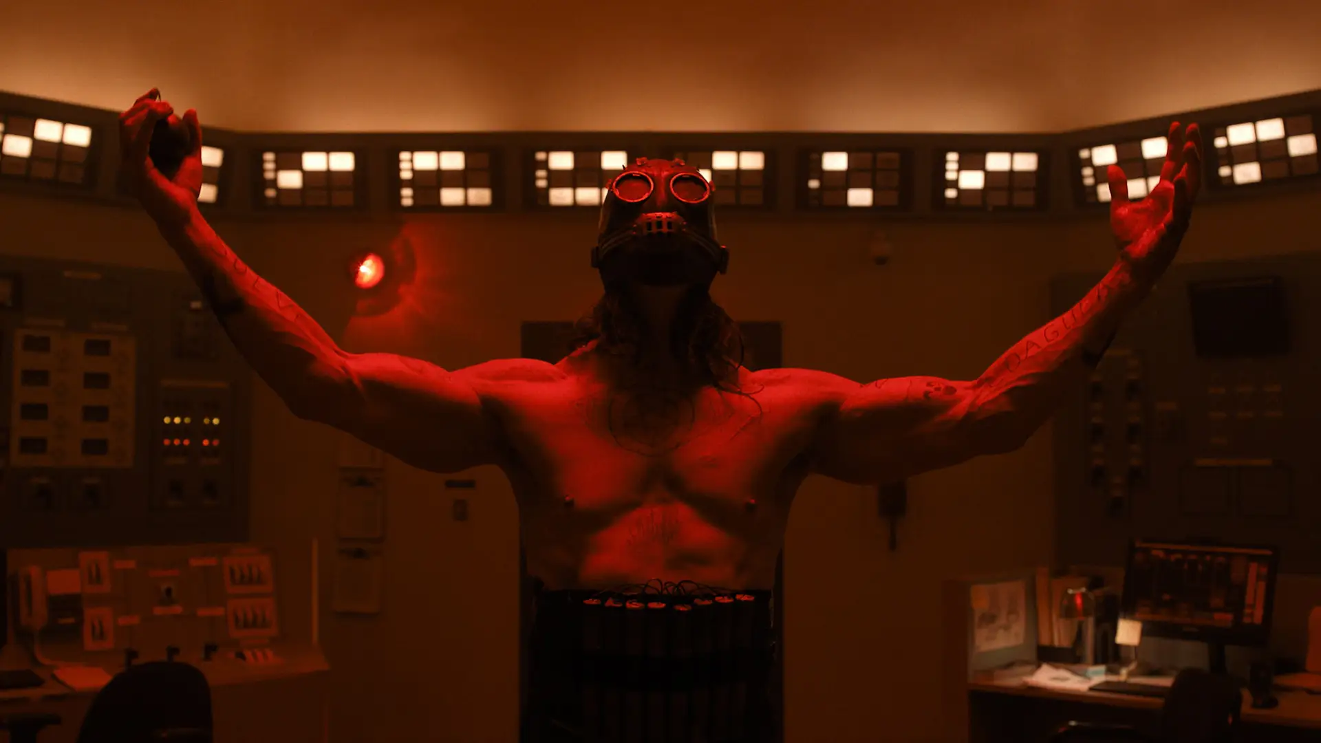 Man in mask holding hands in the air in Psycho Killer movie