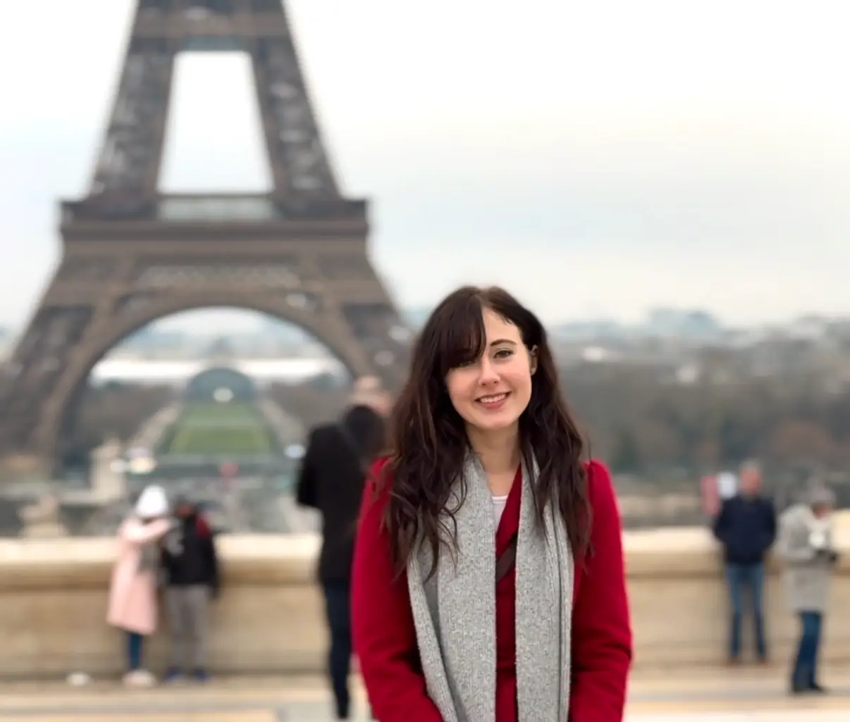 Woman standing in front of eiffel tower