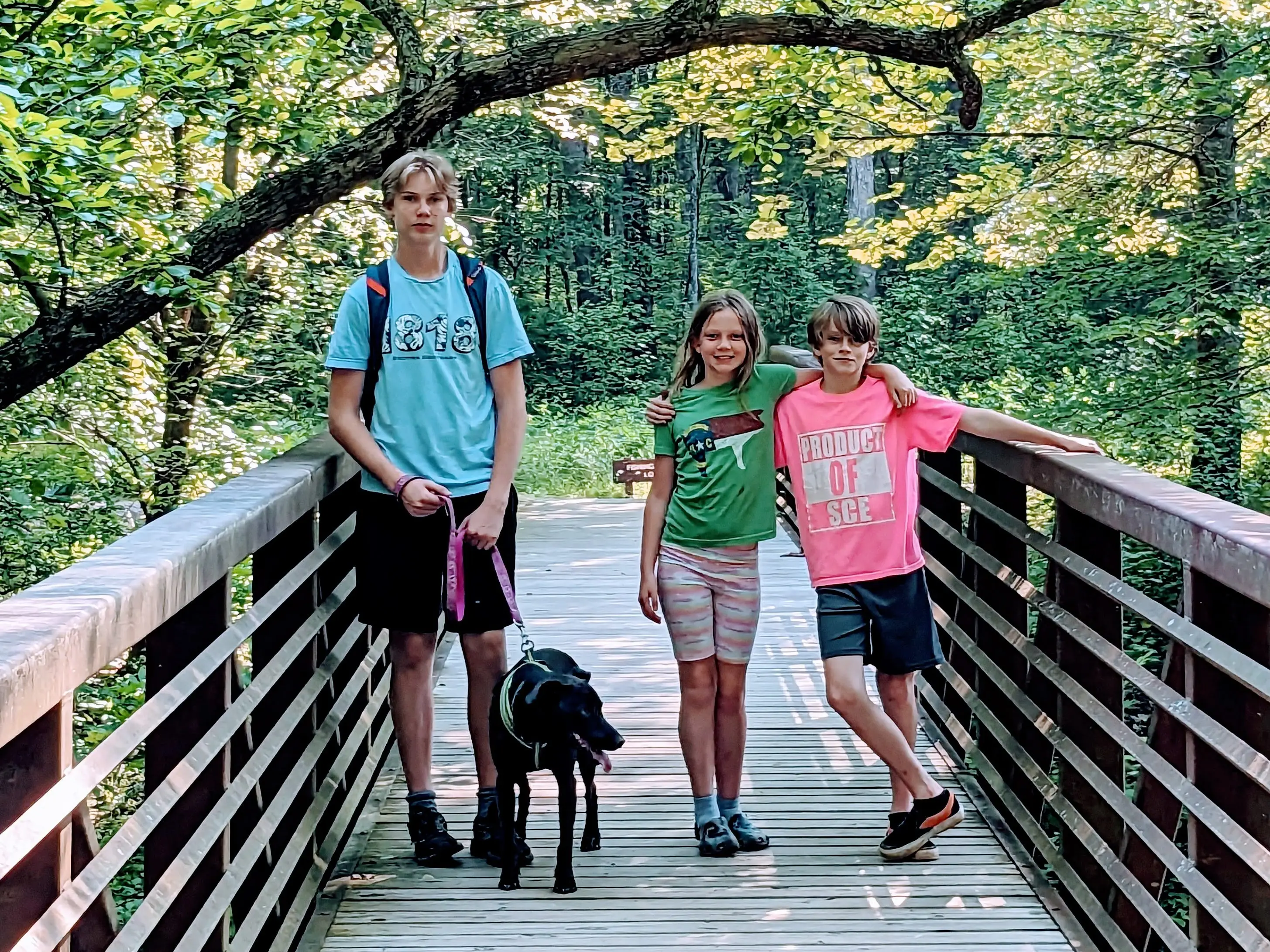 The author's children pose on a bridge.