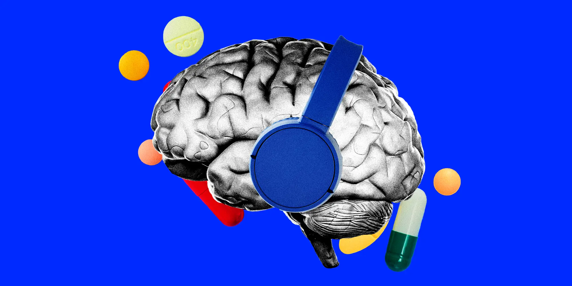 A human brain with a pair of headphones and supplement pills