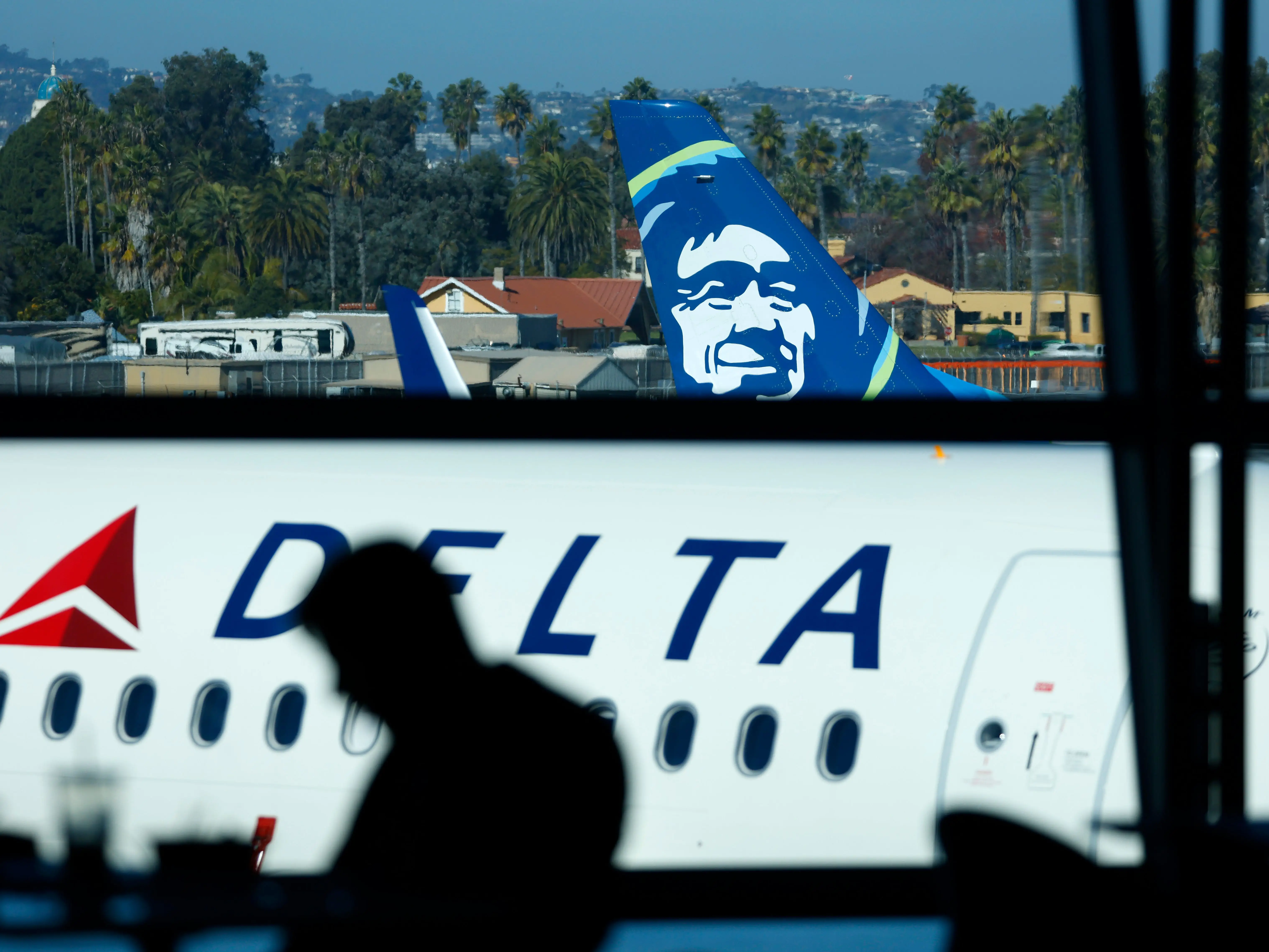 Delta and Alaska at gate.