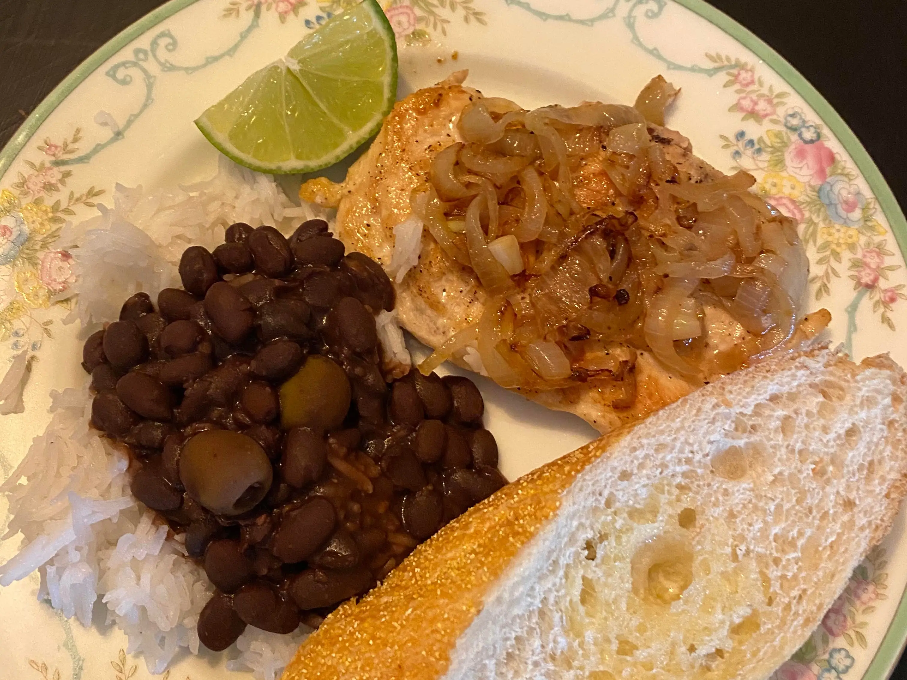 Plate of homemade beans, rice, bread