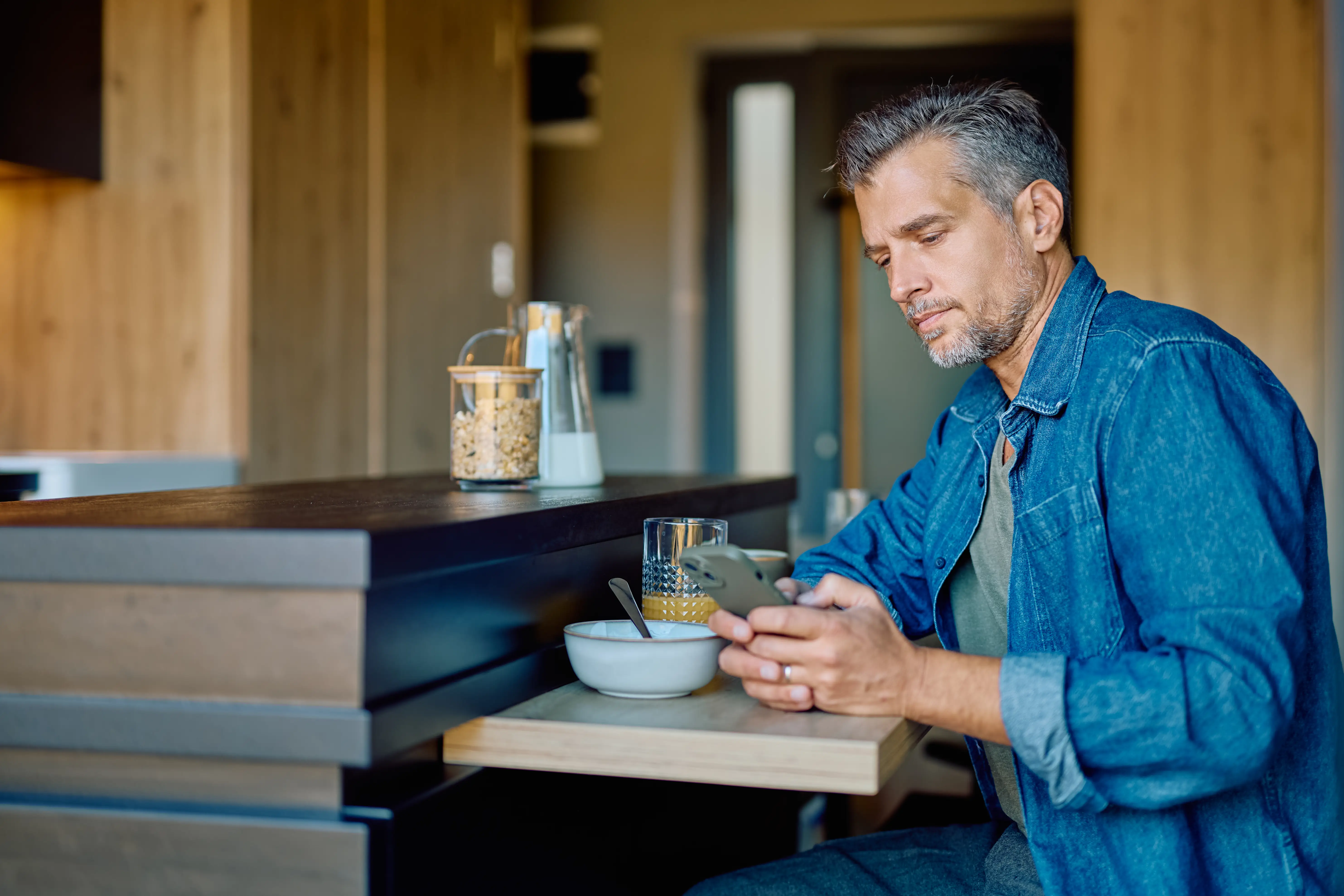 man looking at phone
