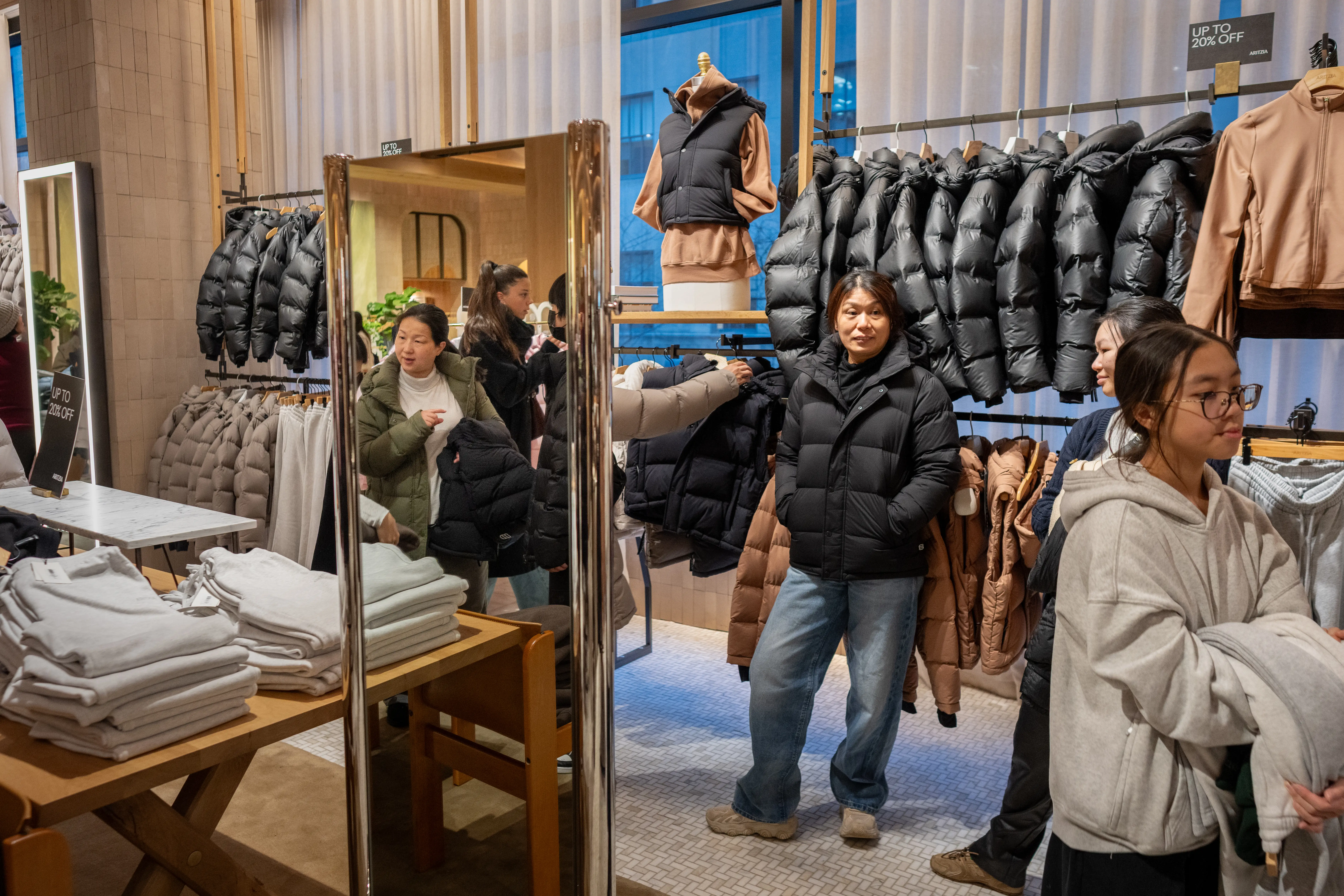 Christmas shoppers browse in Aritzia on December 24, 2025 in New York City.