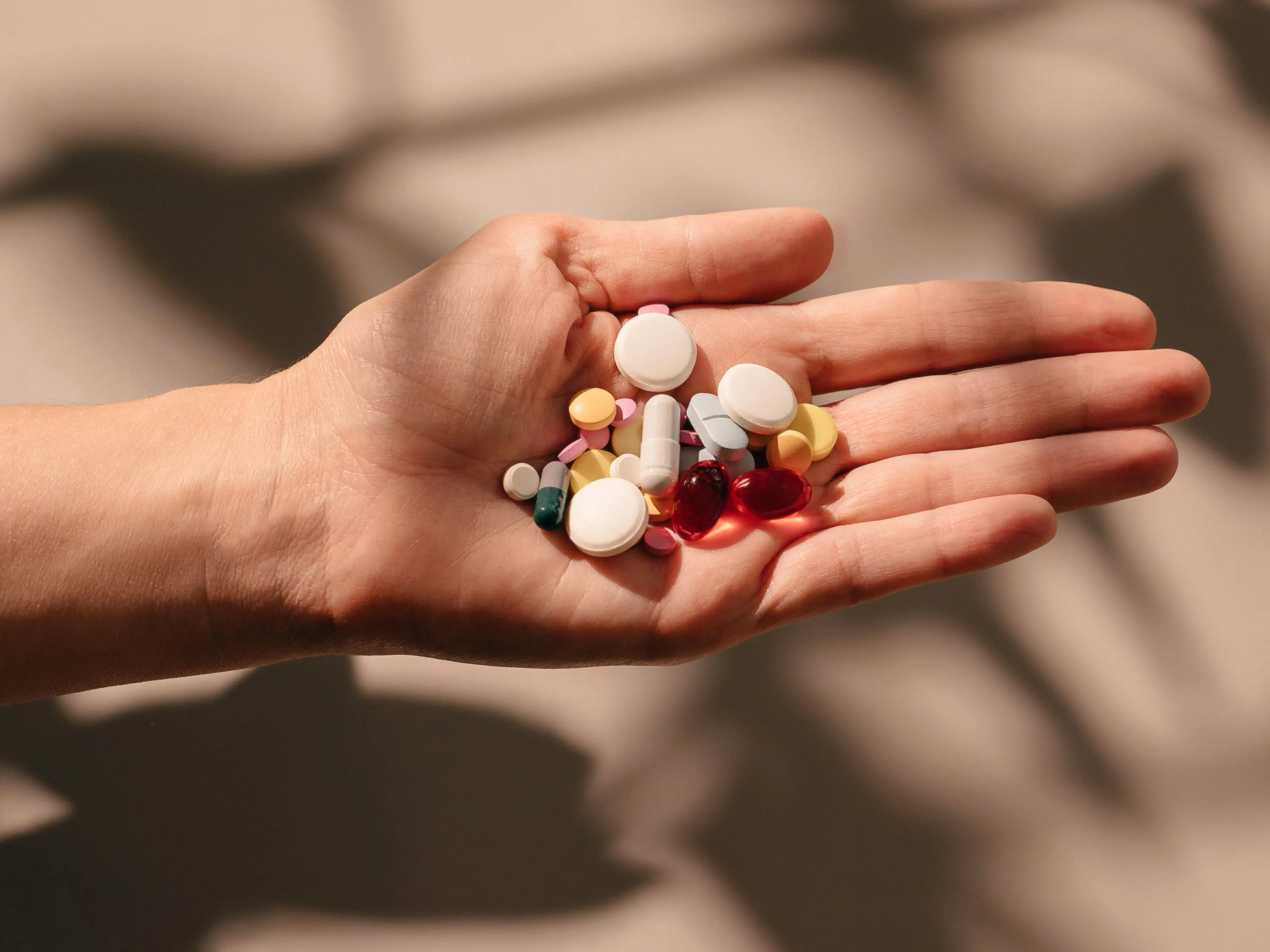 Hand holding supplements