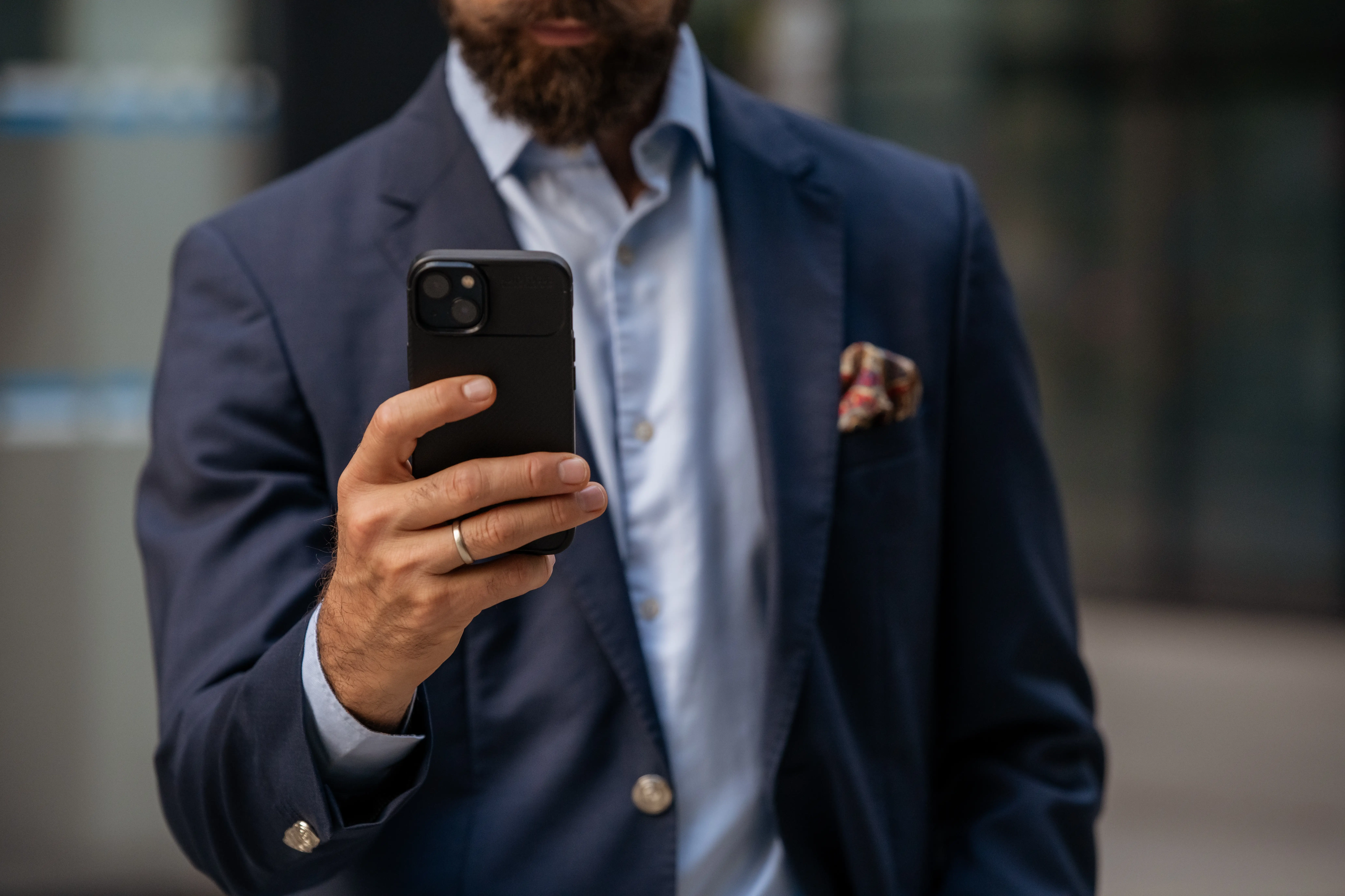 A man holding a smartphone.