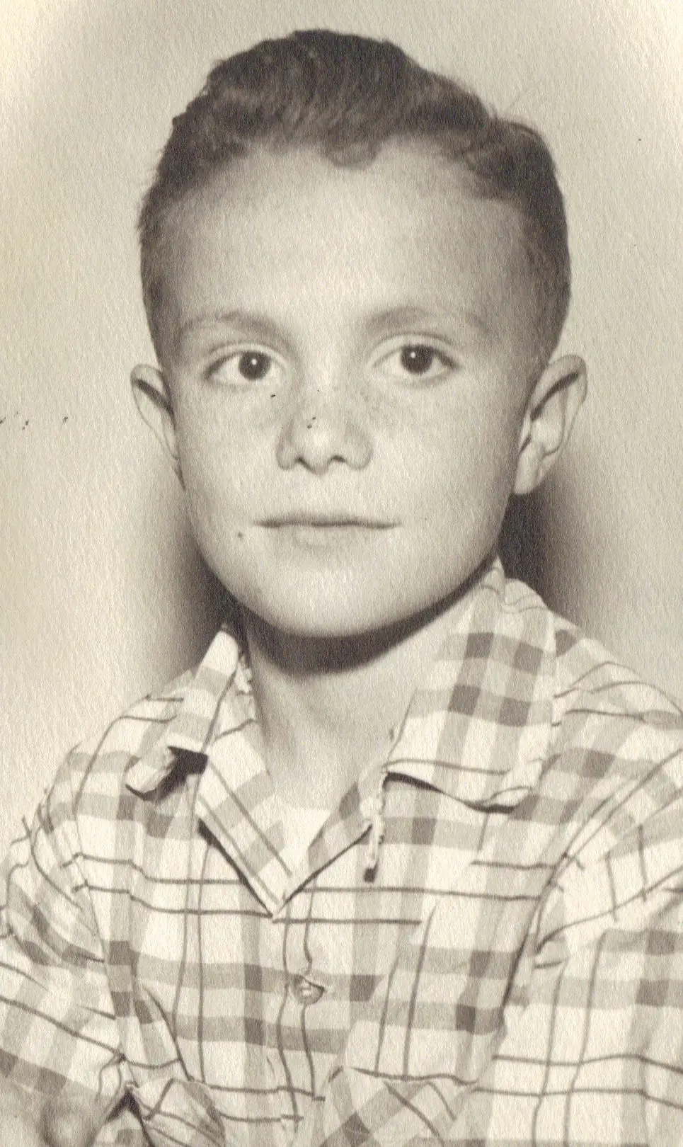 The author's father, shown at age 9.