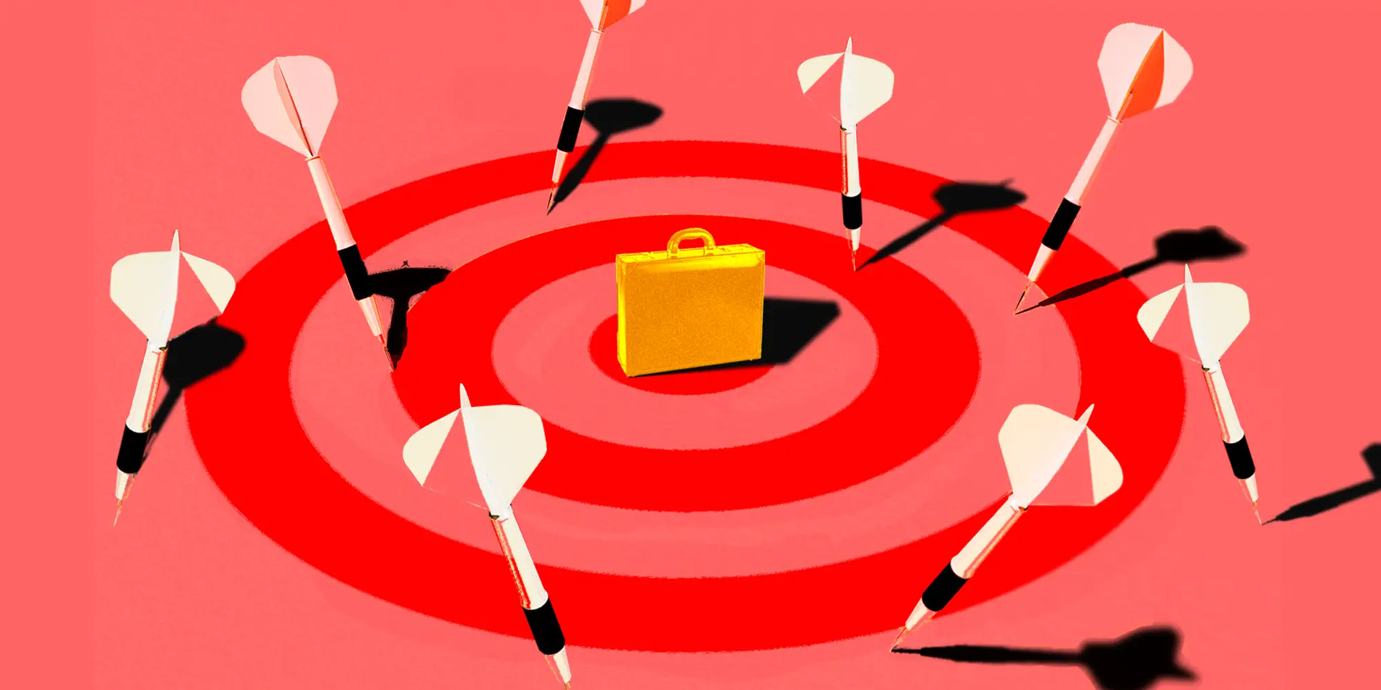 A bullseye with a golden suitcase in the center surrounded by darts
