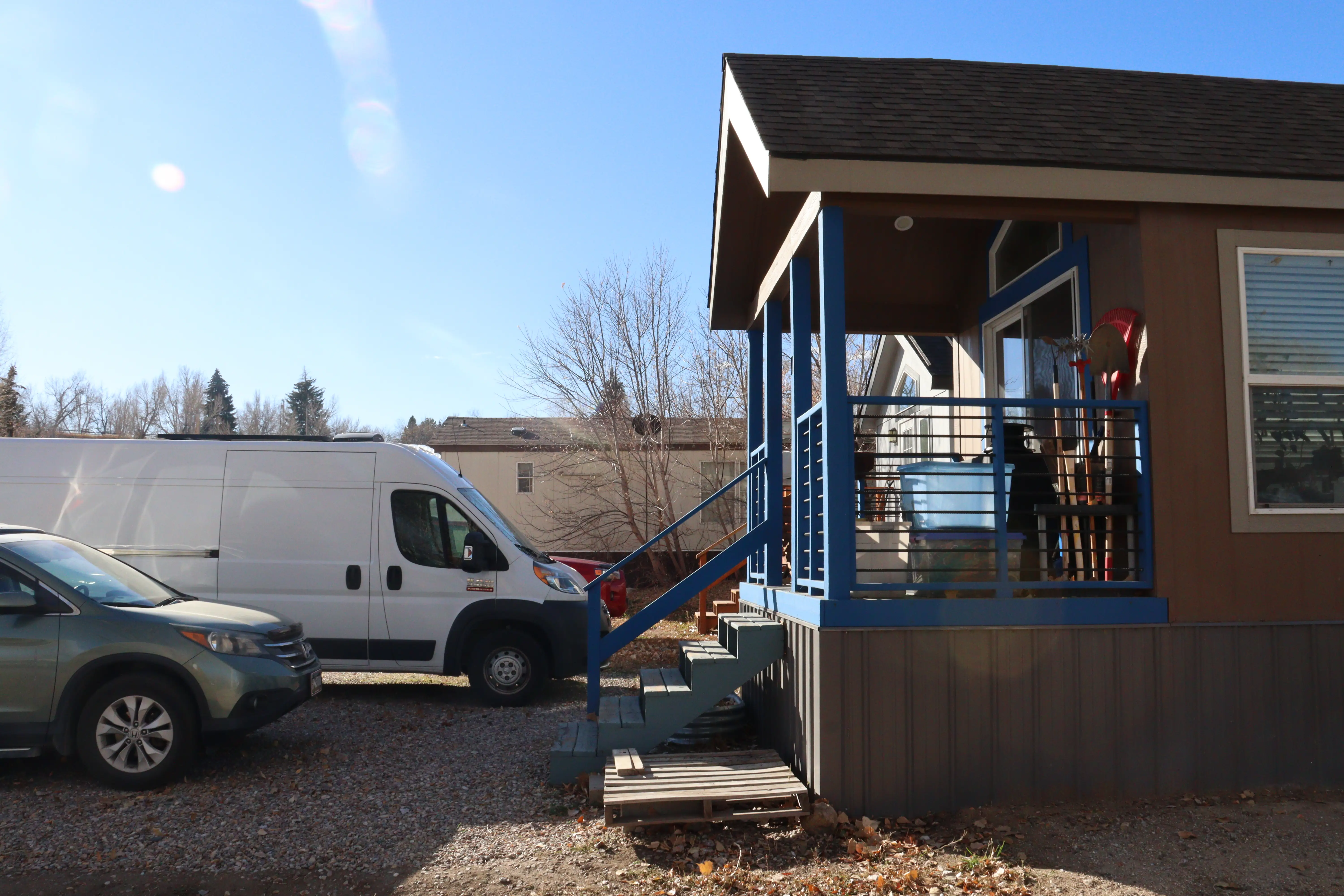 van parked outside of tiny home