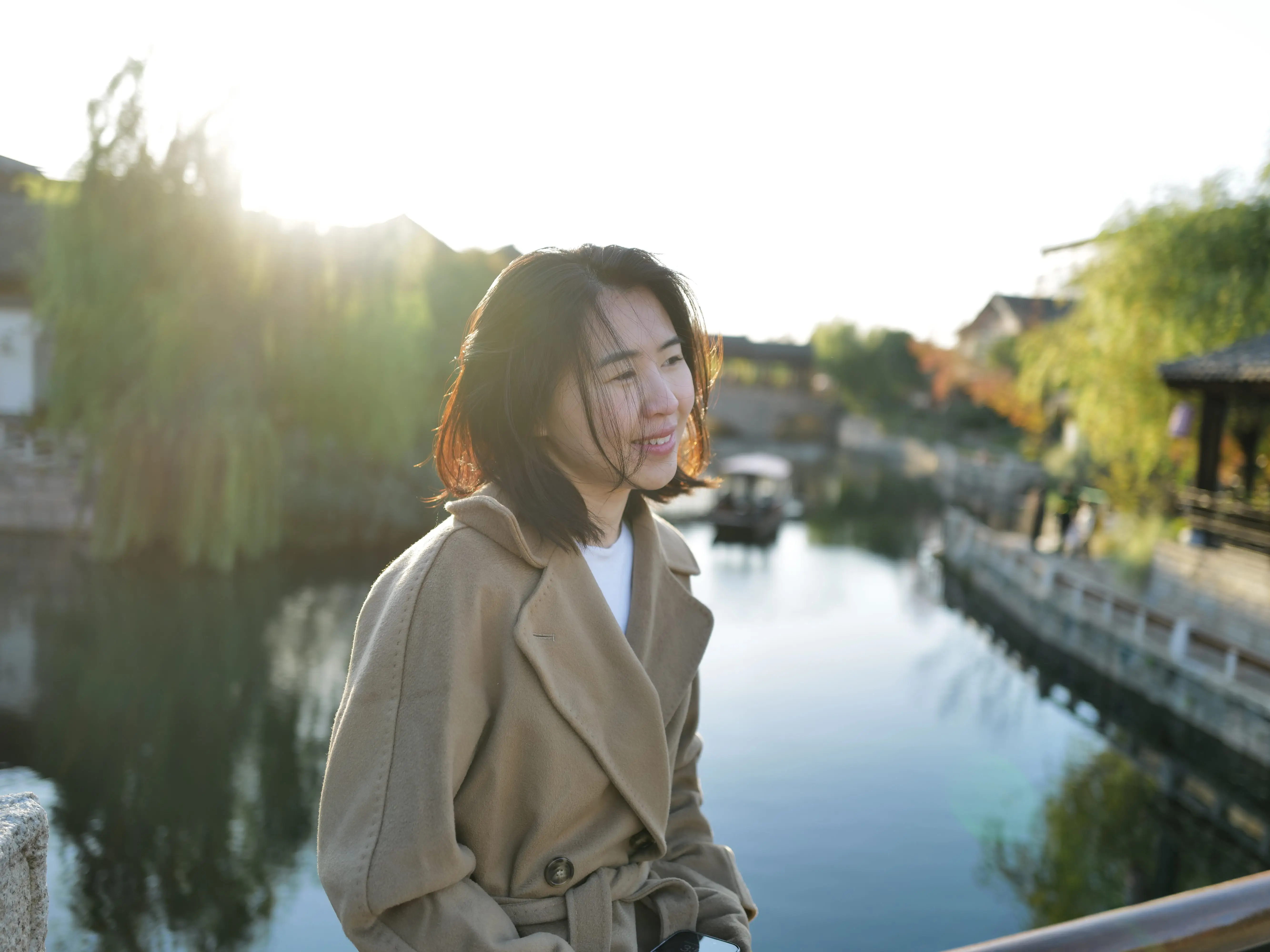A woman posiing for a photo in Shanghai.