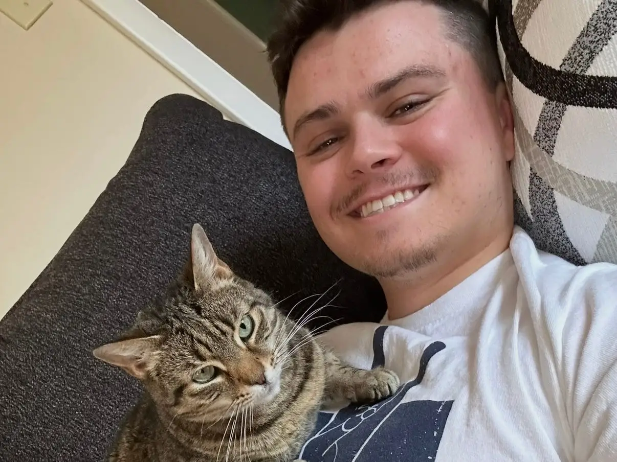 Teddy Rainville and his cat