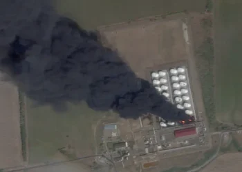 Ukraine’s elite Alpha group hit Russian ammo and oil with deep-strike drones, sparking explosions and fires, security official says