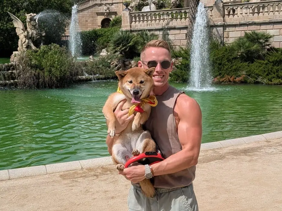 Ethan Spibey with his dog in Barcelona