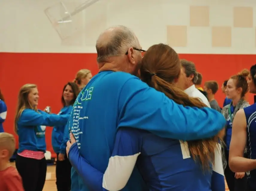 Allie Hubers hugging her grandfather