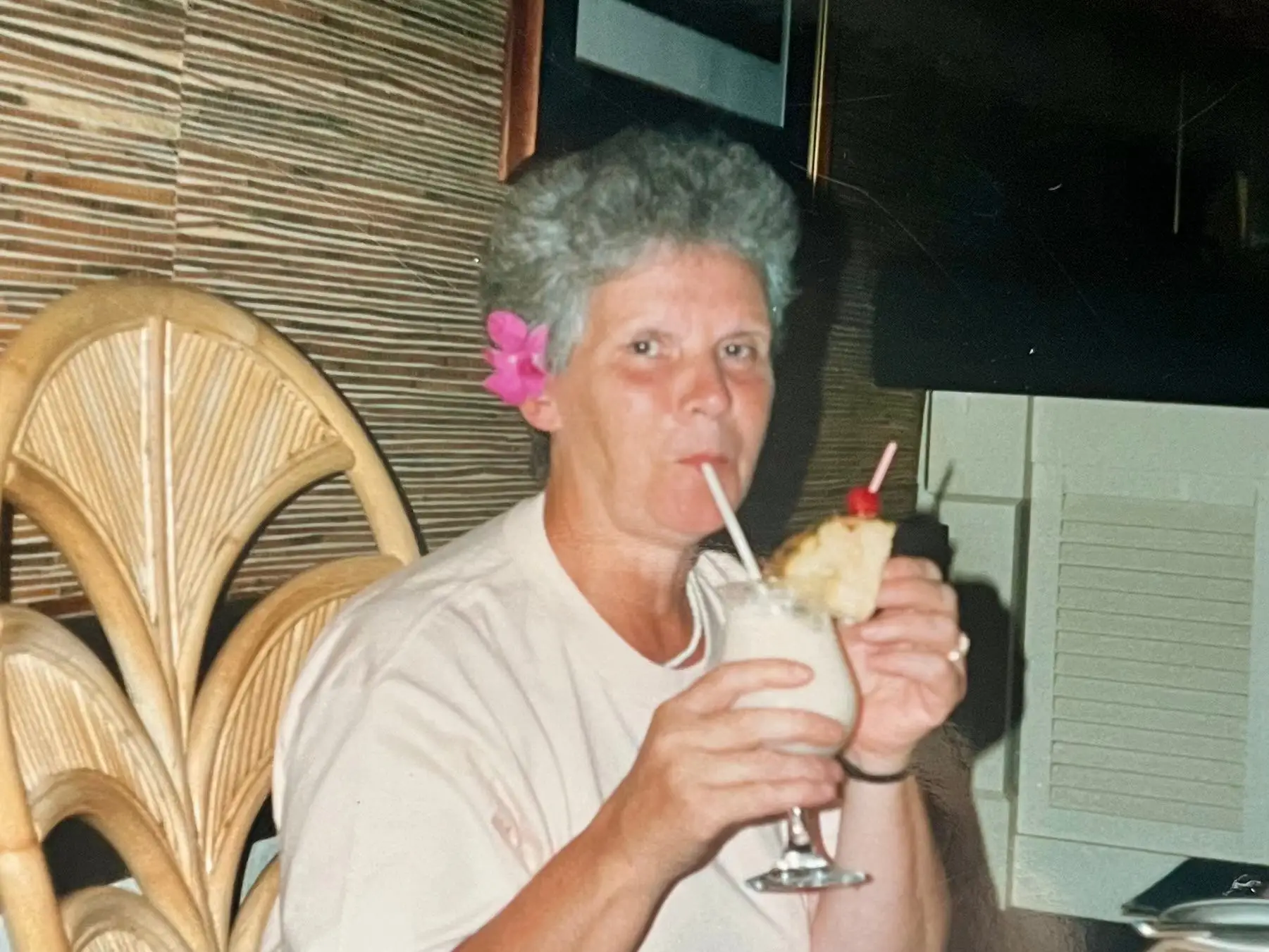 The author's grandmother enjoying a cocktail.