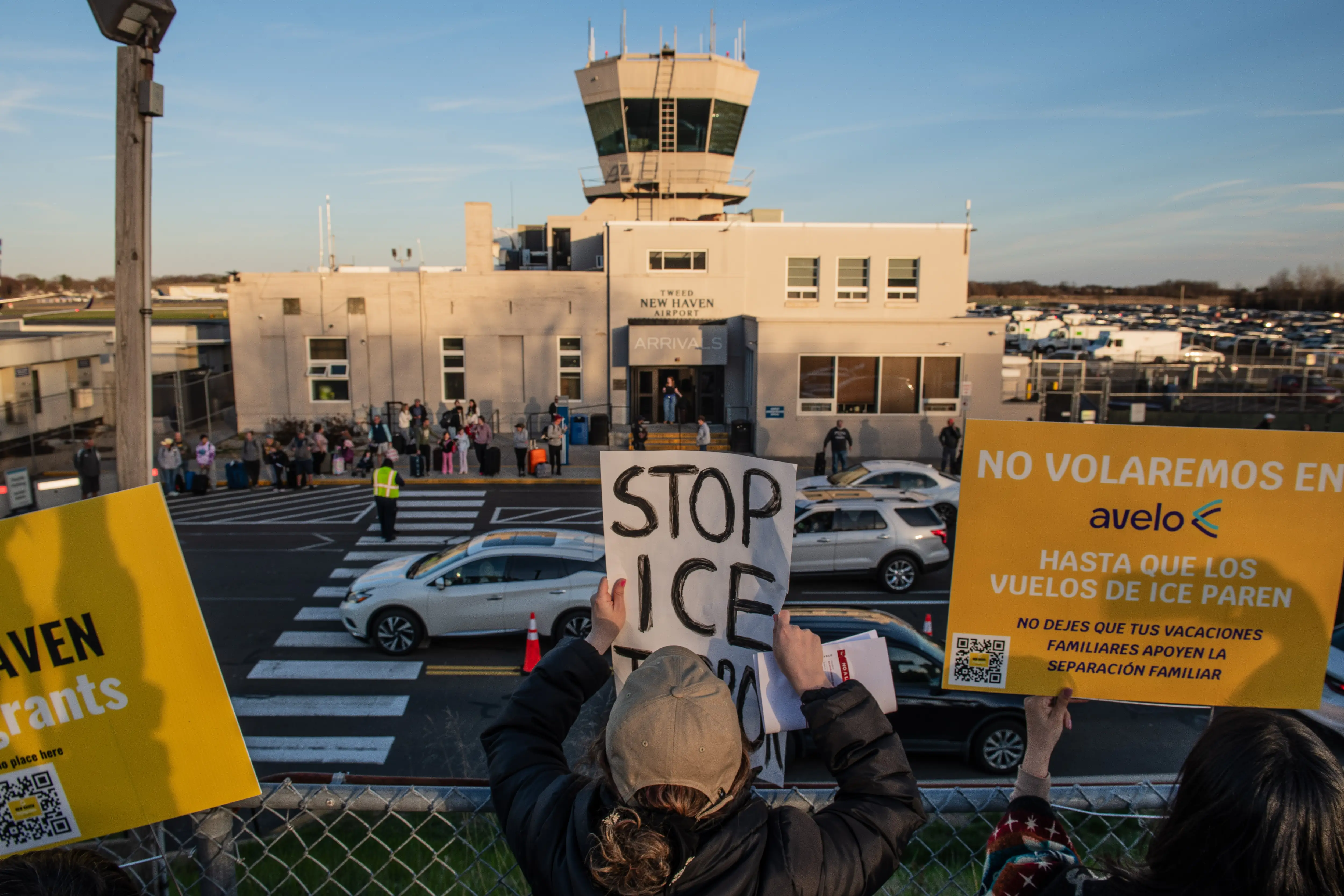 Protesters outside New Haven airport.