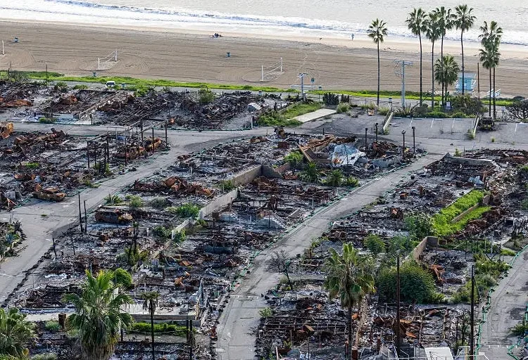 Photos show the Pacific Palisades one year after the Los Angeles wildfires, from empty lots to rebuilt storefronts