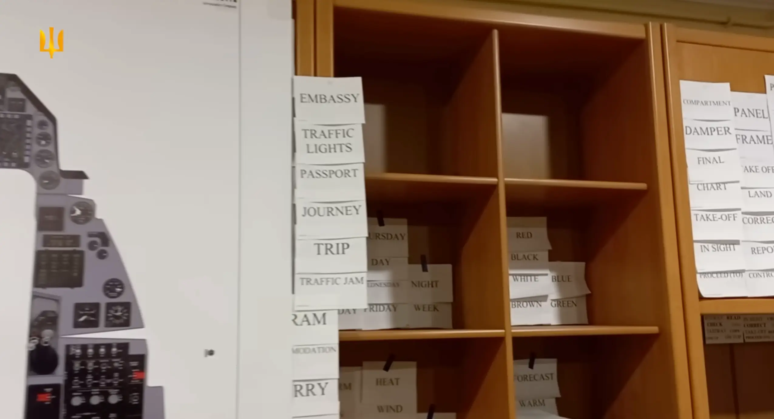 English words printed on paper study cards, such as