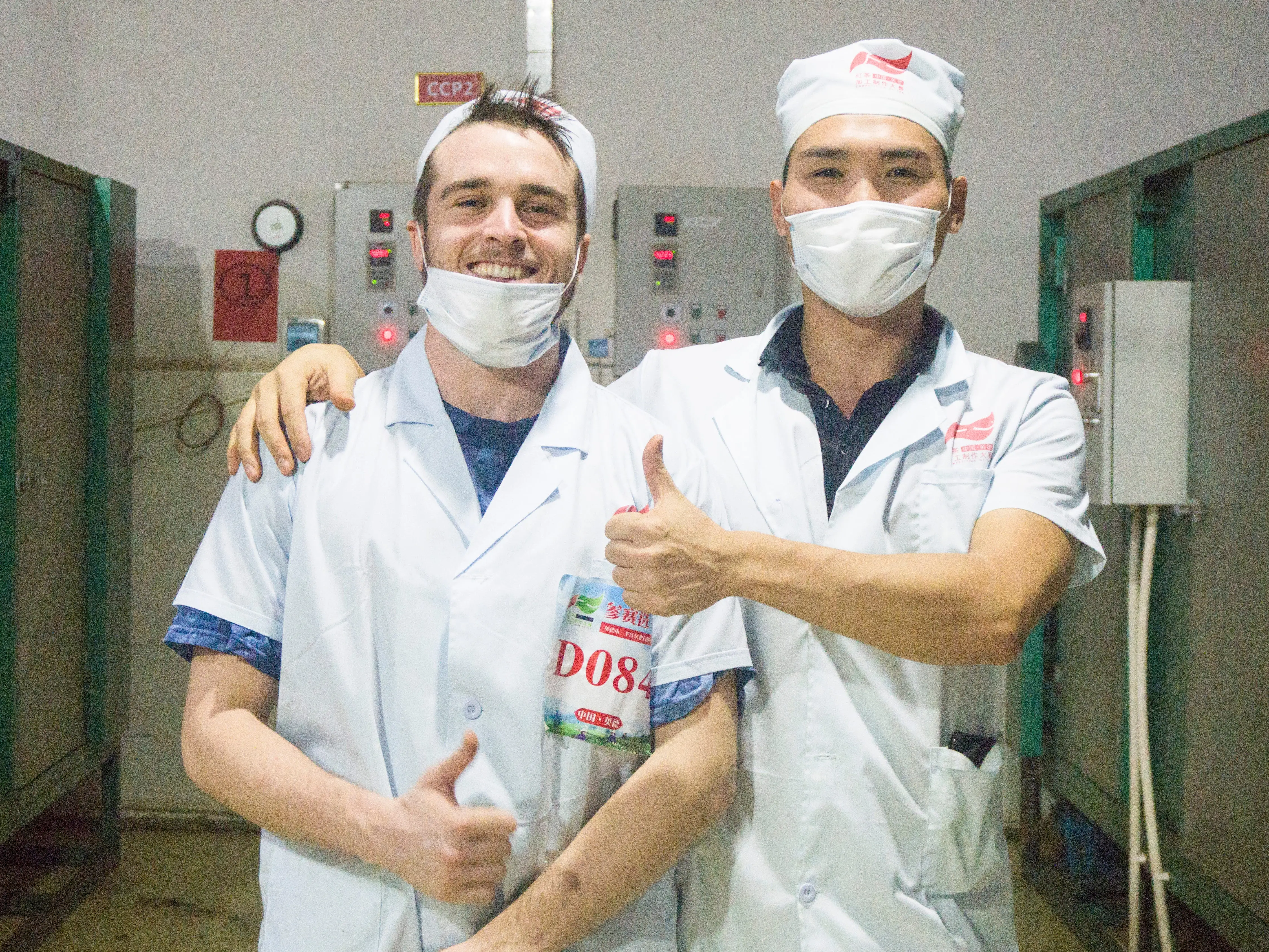 Two men participating in a Black Tea production competition in Yingde, Guangdong.