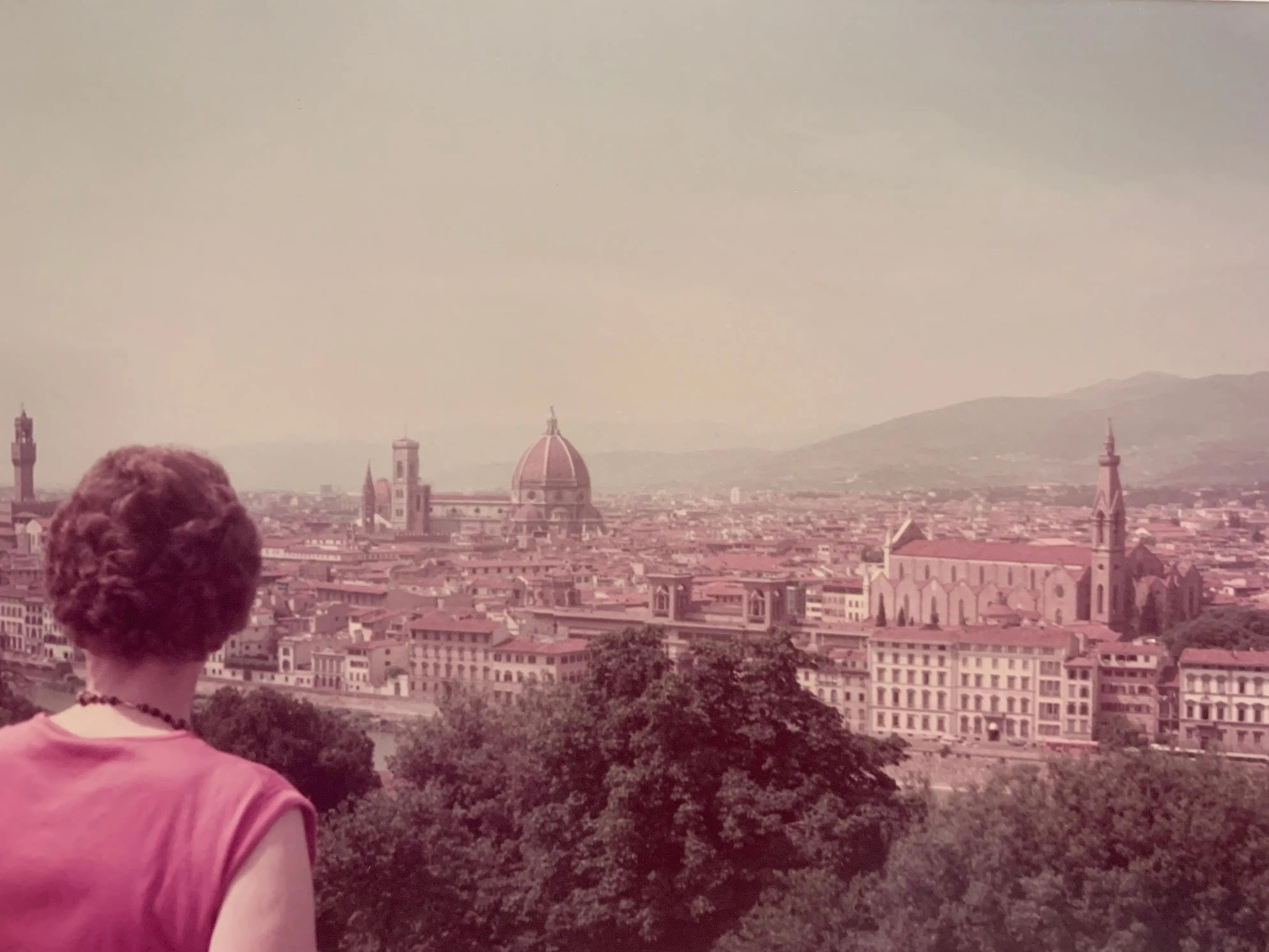 The author's grandmother in Italy looking out over a view.