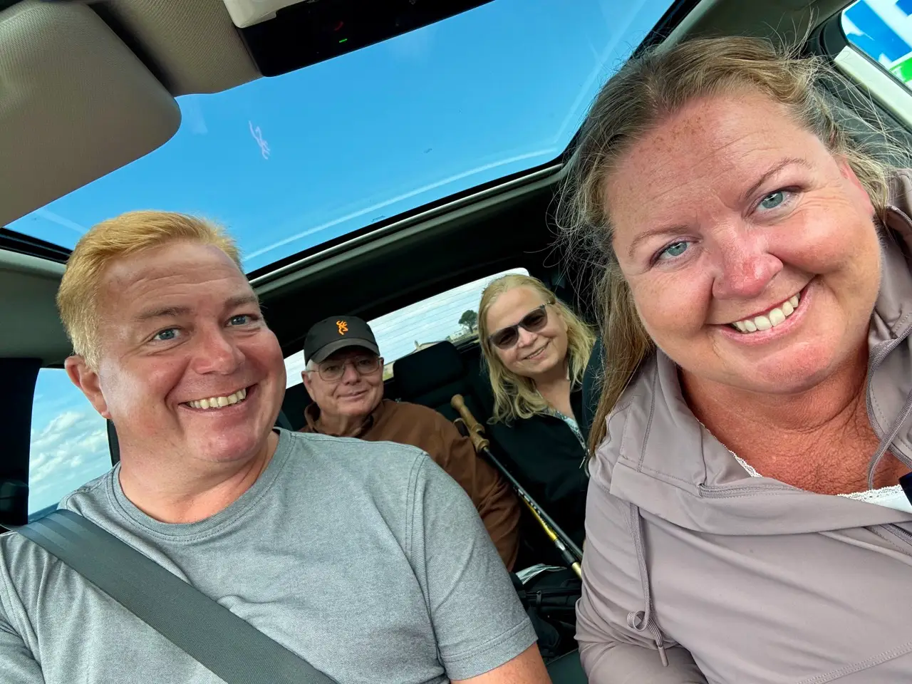 Author, her husband, and in laws in a car